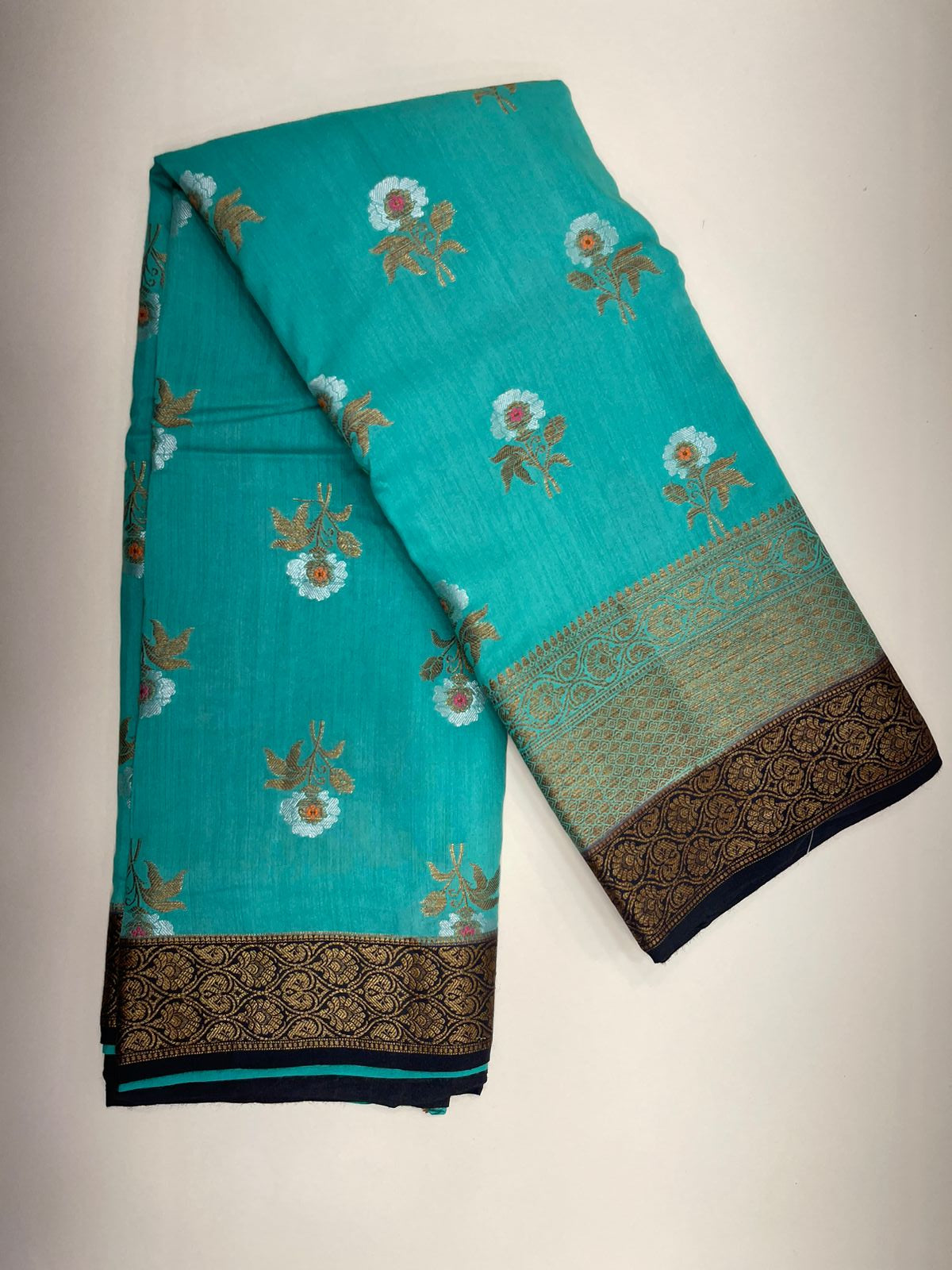 Faishana Pure Silk Handloom Sea Green Muga Silk Zari Mina Floral Booti Contrast Navy Blue Anchal Copper Zari Border Banarasi Saree with Navy Blouse