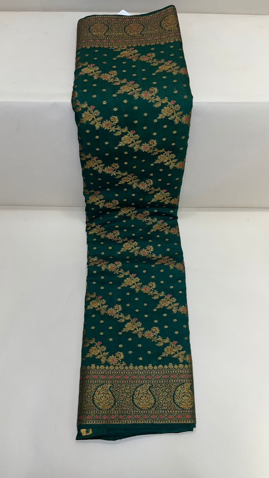 Faishana Presents Pure Silk Handloom Dark Green Muga Silk with Copper Zari Paisley Border and Dark Green Blouse
