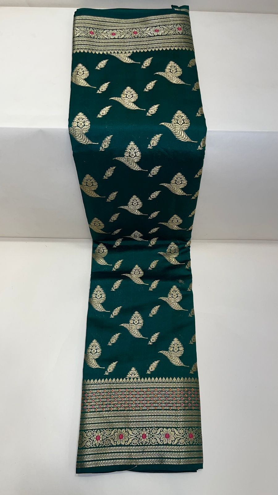 Enchanting Elegance: Faishana Pure Silk Handloom Dark Green Chiniya Silk Gold Floral Zari Booti with Minakari Border & Dark Green Blouse