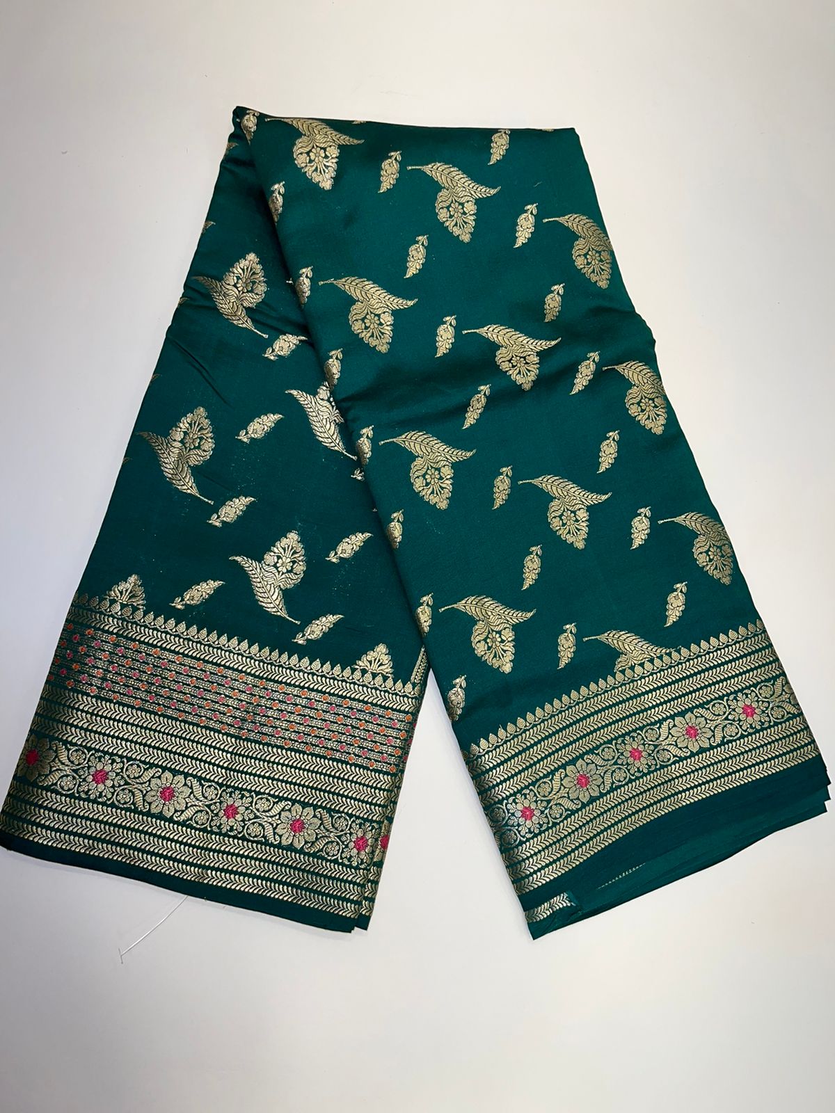 Enchanting Elegance: Faishana Pure Silk Handloom Dark Green Chiniya Silk Gold Floral Zari Booti with Minakari Border & Dark Green Blouse