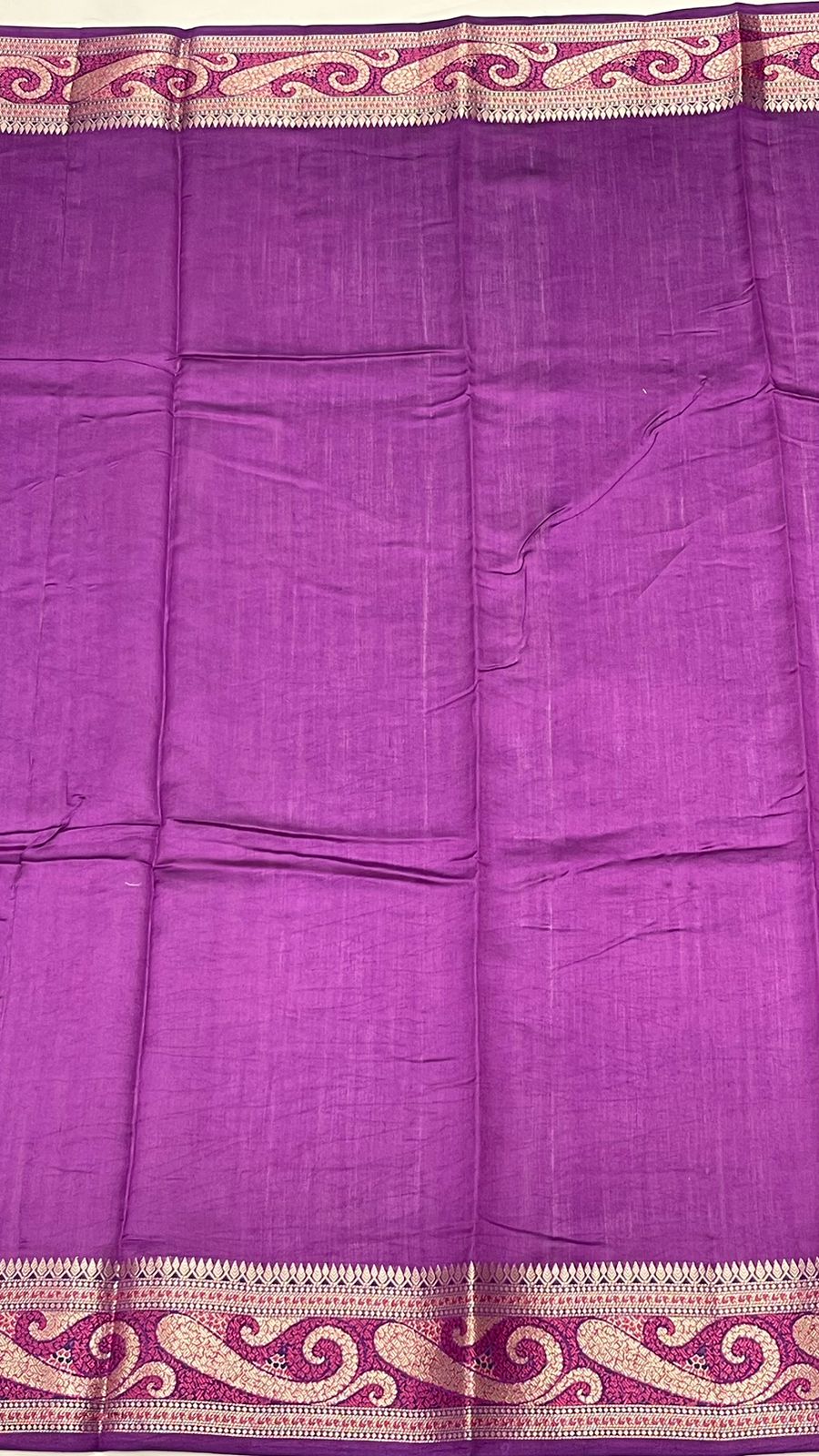 Regal Elegance: Faishana's Pure Silk Handloom Purple Chiniya Silk with Gold Zari Booti Tilfi Anchal and Tilfi Zari Border Paired with Exquisite Purple Blouse Piece