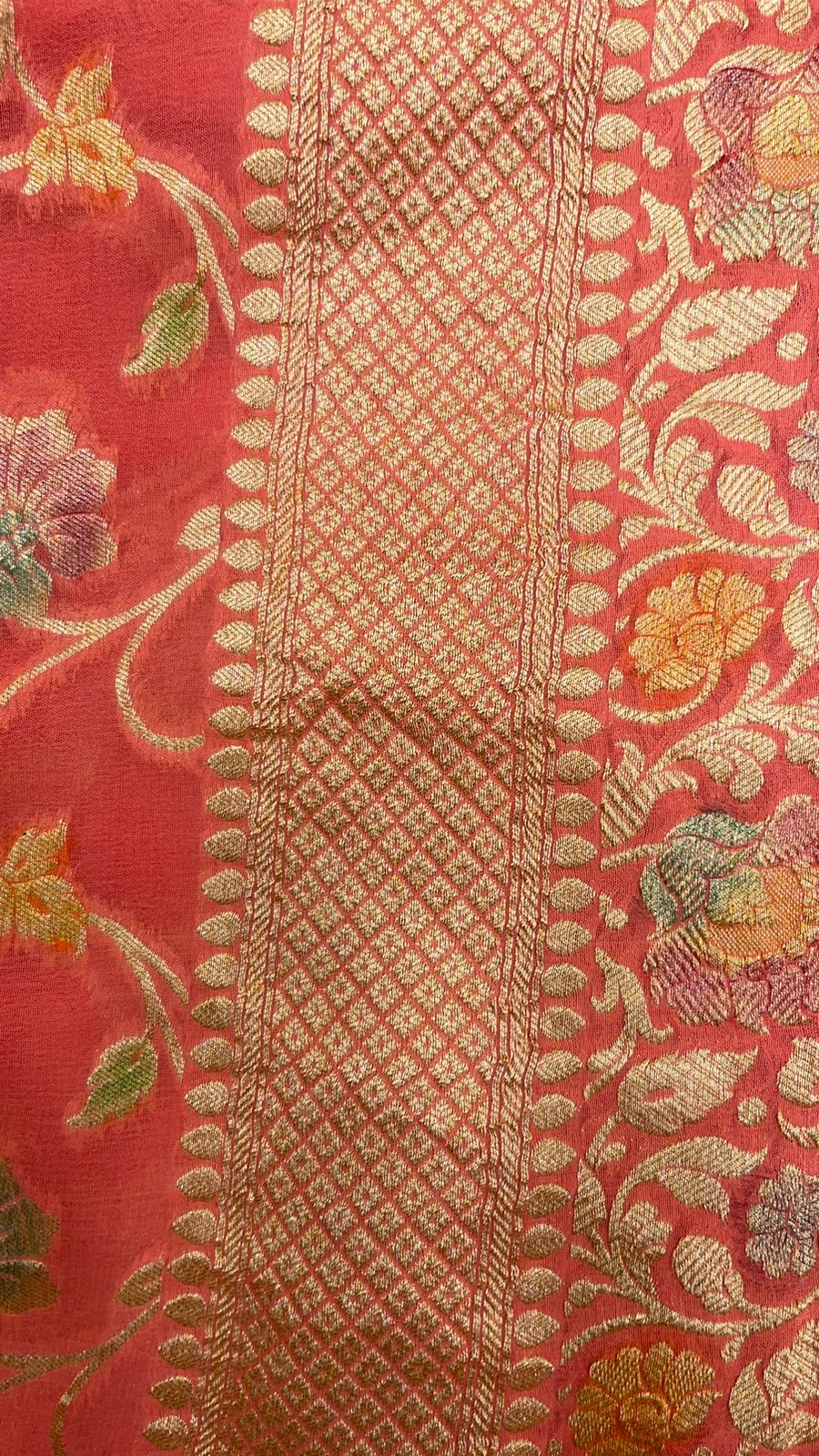 Radiant Threads: Faishana's Pure Silk Handloom Orange Khaddi Georgette Hand Brush Floral Zari Kadhwa Jaal with Banarasi Zari Border with an Orange Blouse