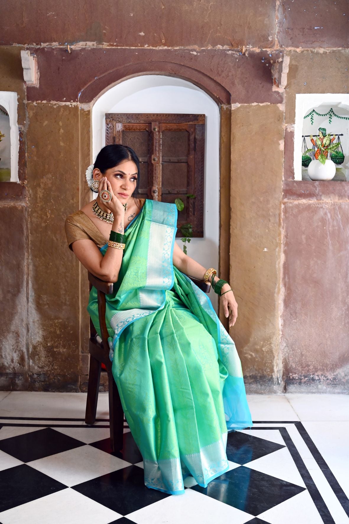 Faishana Presents Green Resham Brocade Contrast Turquoise Blue Zari Pattu Border Banarasi Saree