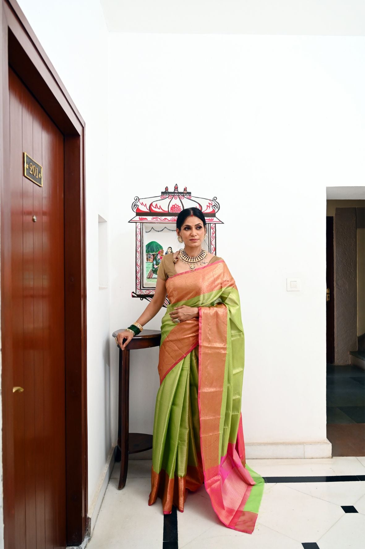 Faishana Presents Light Green Kanchi Silk Zari Brocade Contrast Meena Pink Pattu Border Banarasi Saree