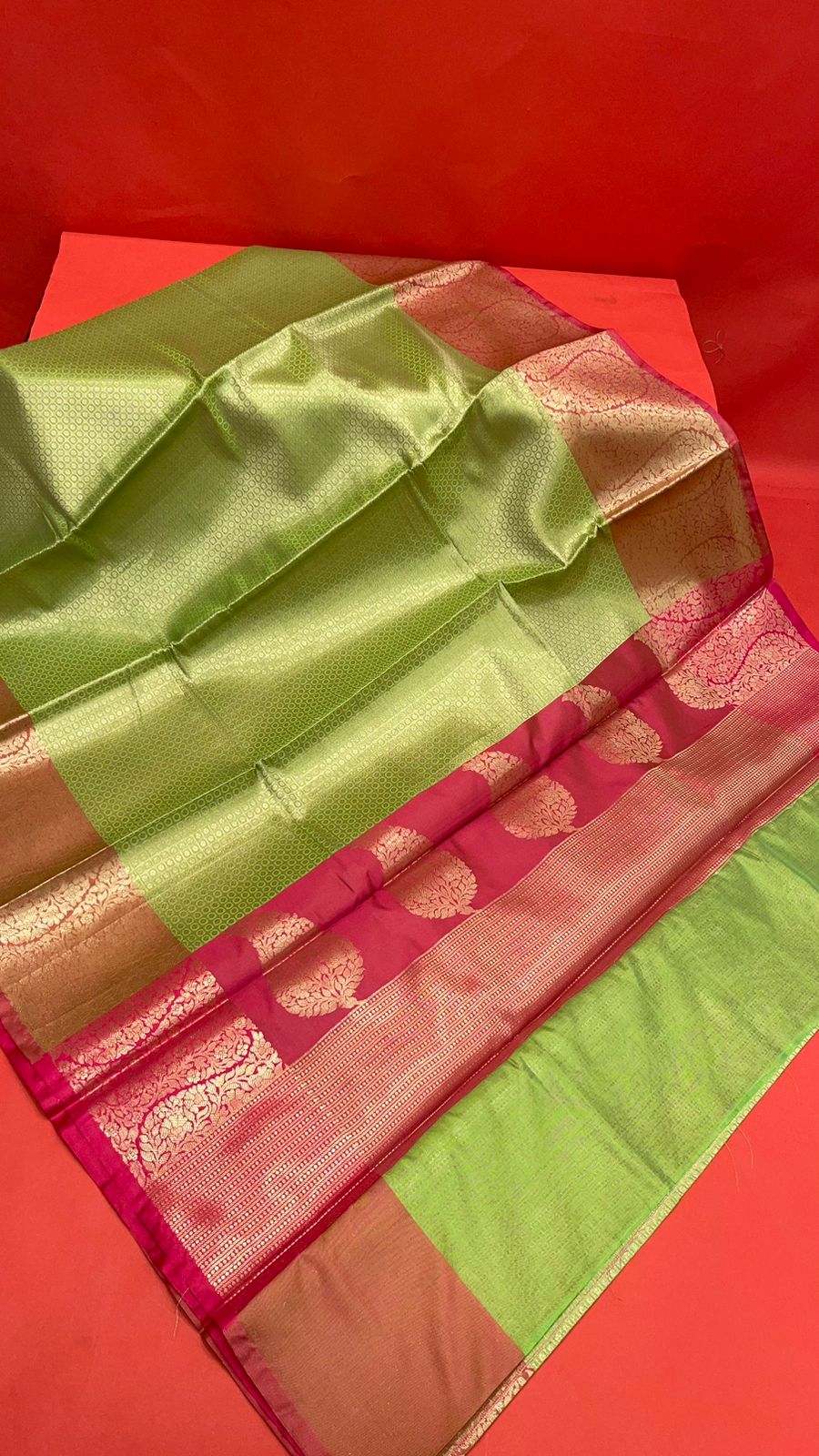 Faishana Presents Parrot Green Zari Kanchi Silk Brocade Contrast Pink Zari Pattu Border Banarasi Saree