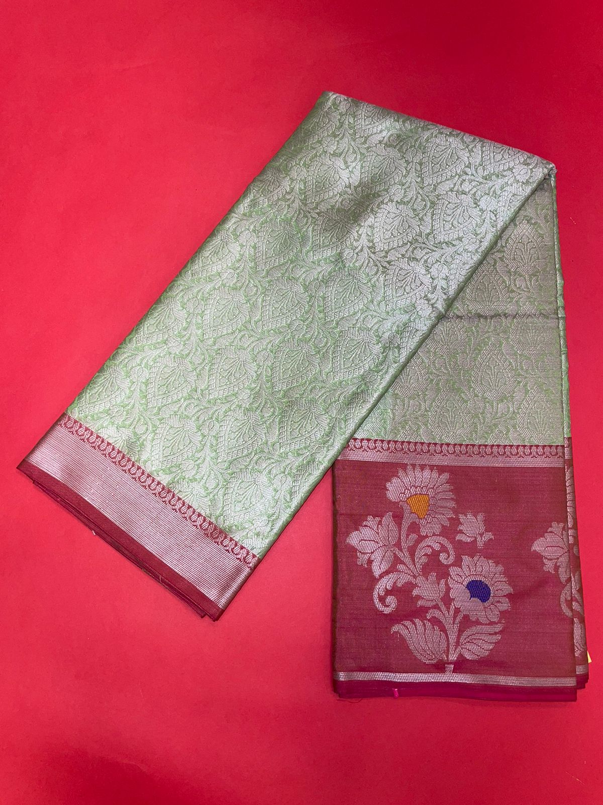 Faishana Presents Green Silver Zari Kanchi Silk Tanchoi Brocade Contrast Maroon Skirt Meena Border Banarasi Saree