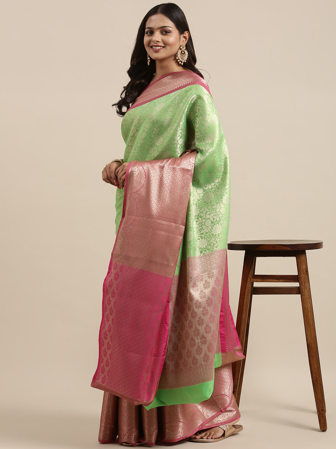 Faishana Presents Presents Green Kanchi Silk Zari Brocade Contrast Zari Brocade Pink Pattu Border Banarasi Saree.