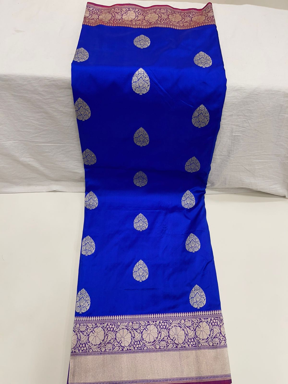 Exquisite Faishana Pure Handloom Royal Blue Katan Silk Kadhwa Boota Saree with Zari Border and Contrast Purple Blouse