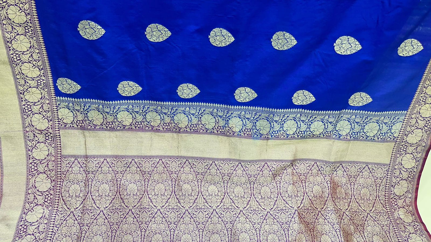 Exquisite Faishana Pure Handloom Royal Blue Katan Silk Kadhwa Boota Saree with Zari Border and Contrast Purple Blouse