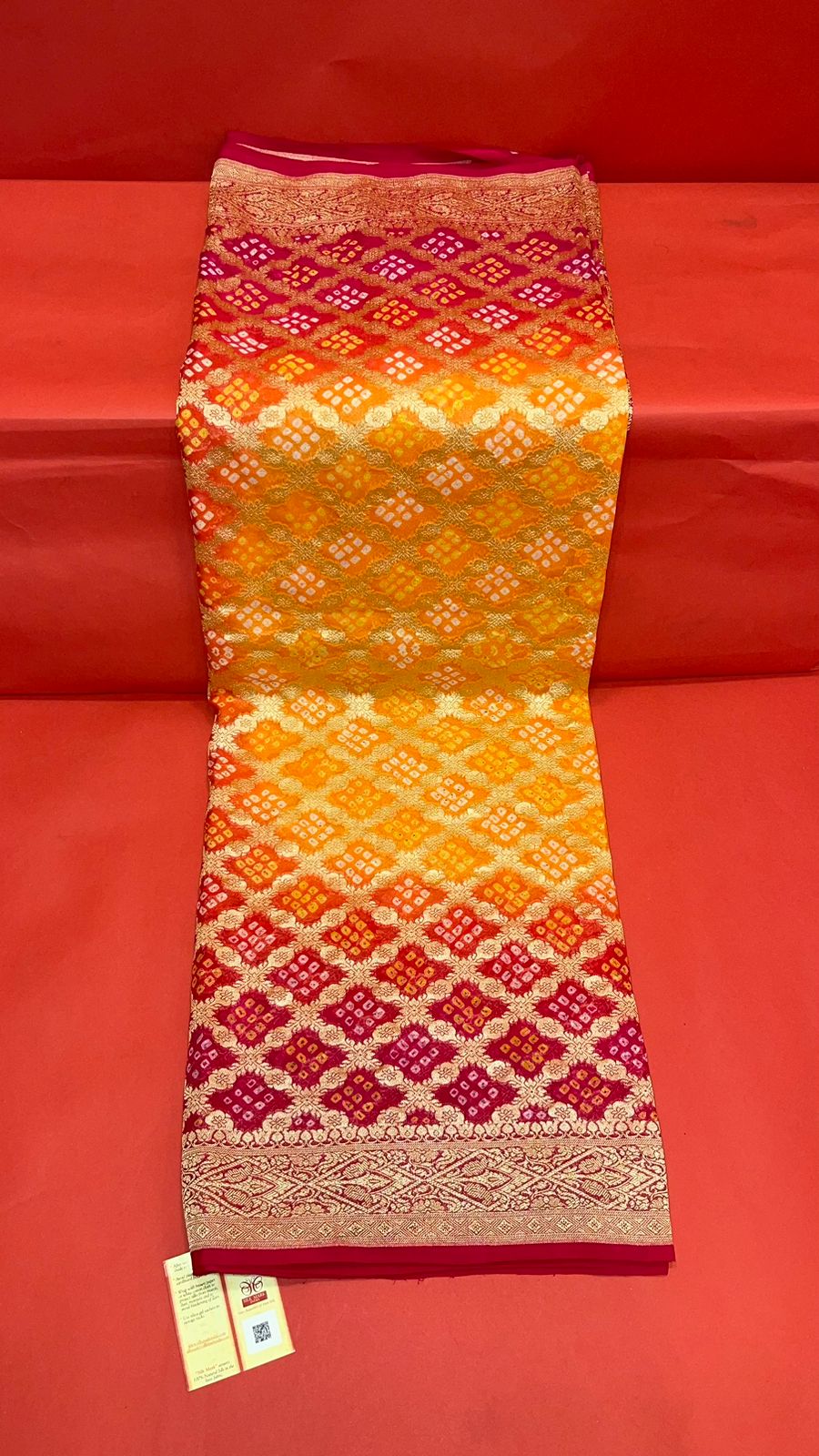 Sunset Splendor: Faishana's Vibrant 2D Yellow and Orange Katan Georgette Bandhej Zari Kadhwa Jaal Chunri Booti with Kadhwa Contrasting Red Pallu and Blouse Saree