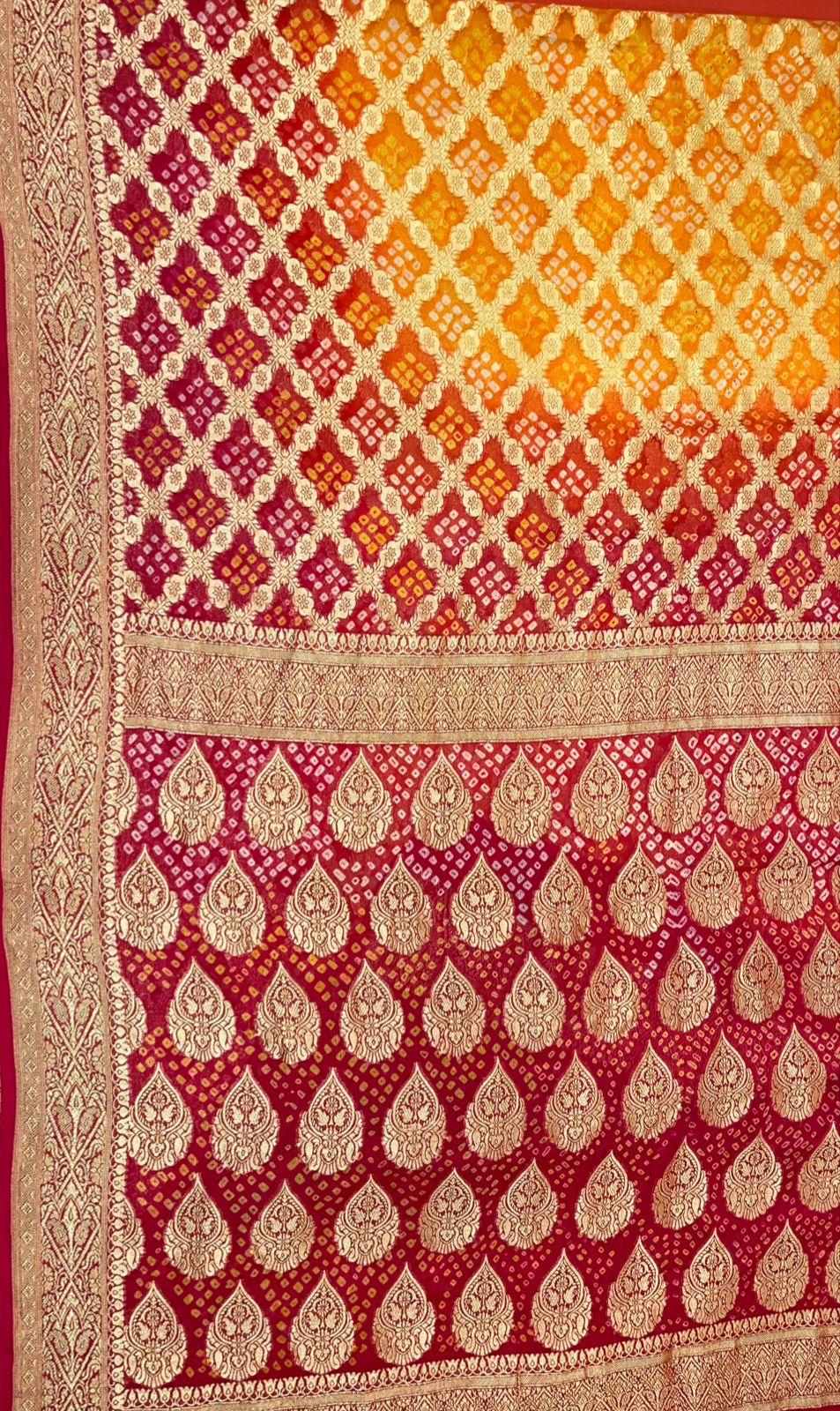 Sunset Splendor: Faishana's Vibrant 2D Yellow and Orange Katan Georgette Bandhej Zari Kadhwa Jaal Chunri Booti with Kadhwa Contrasting Red Pallu and Blouse Saree