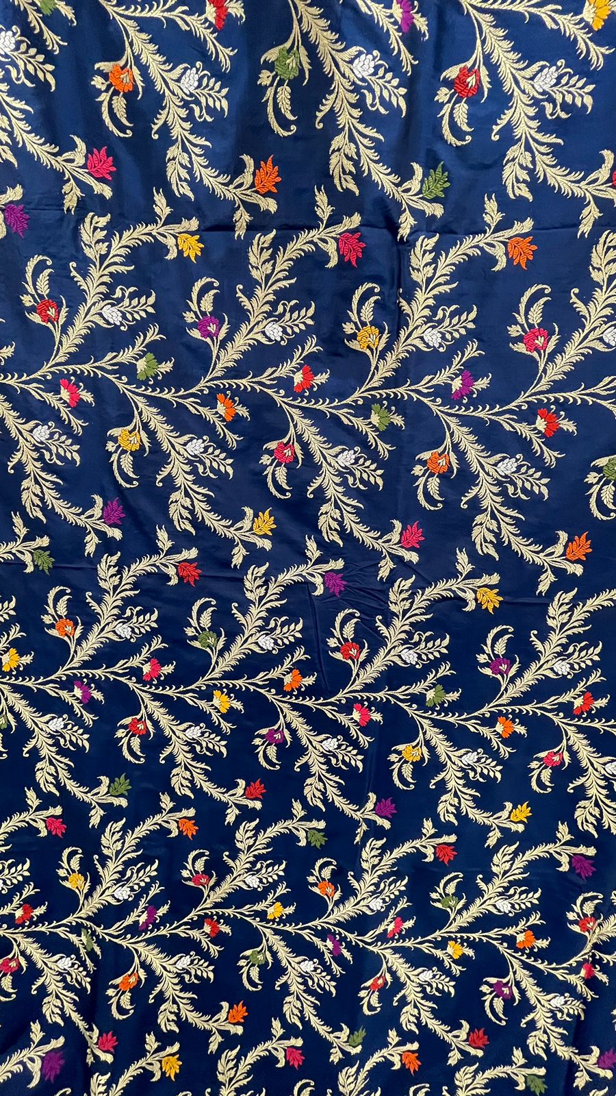 Symphony of Elegance and Tradition: Faishana Pure Handloom Navy Blue Katan Silk Multicolor Minakari Kadhwa Jaal and Zari Border with Navy Stripe Blouse