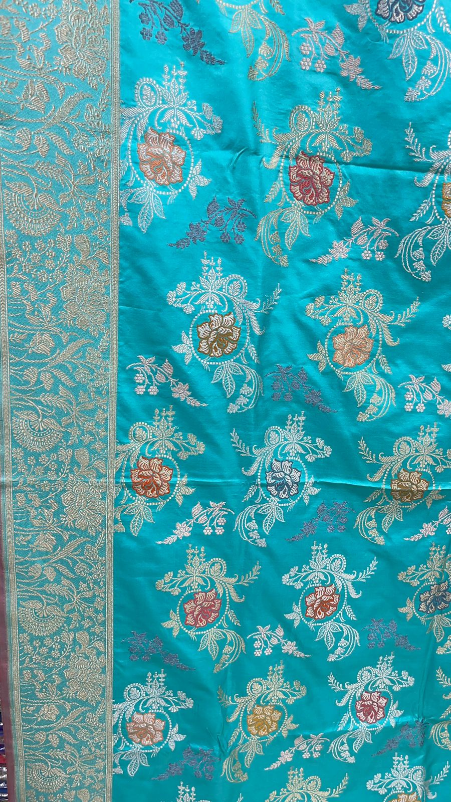 Seagreen Splendor: Faishana Pure Handloom Katan Silk Minakari Kadhwa Floral Jaal Zari Banarasi Border Self-Design Anchal and Sea green Stripe Blouse