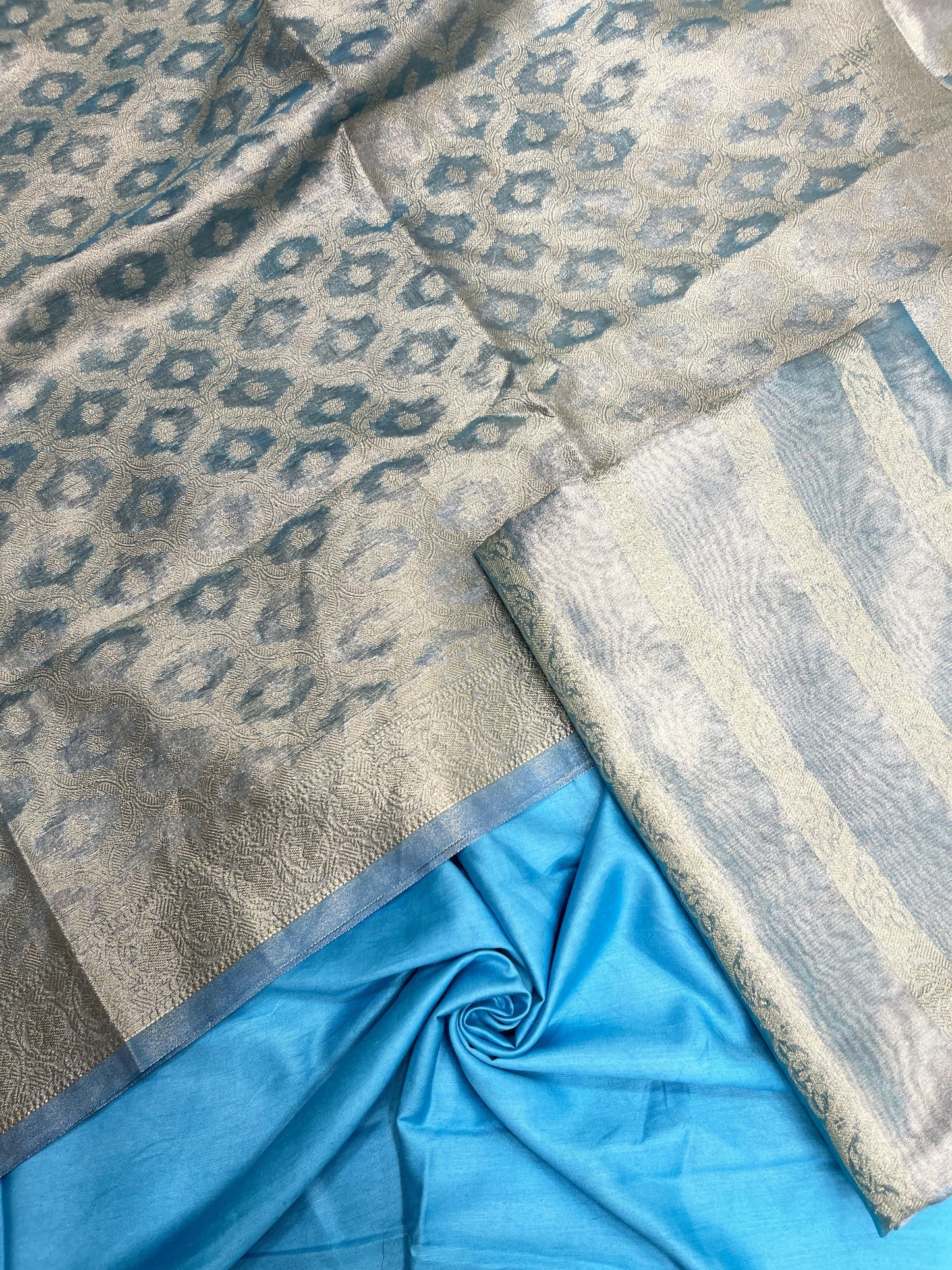 Sky blue tissue silk suit set with floral zari stripe and carry dupatta. SHL_77