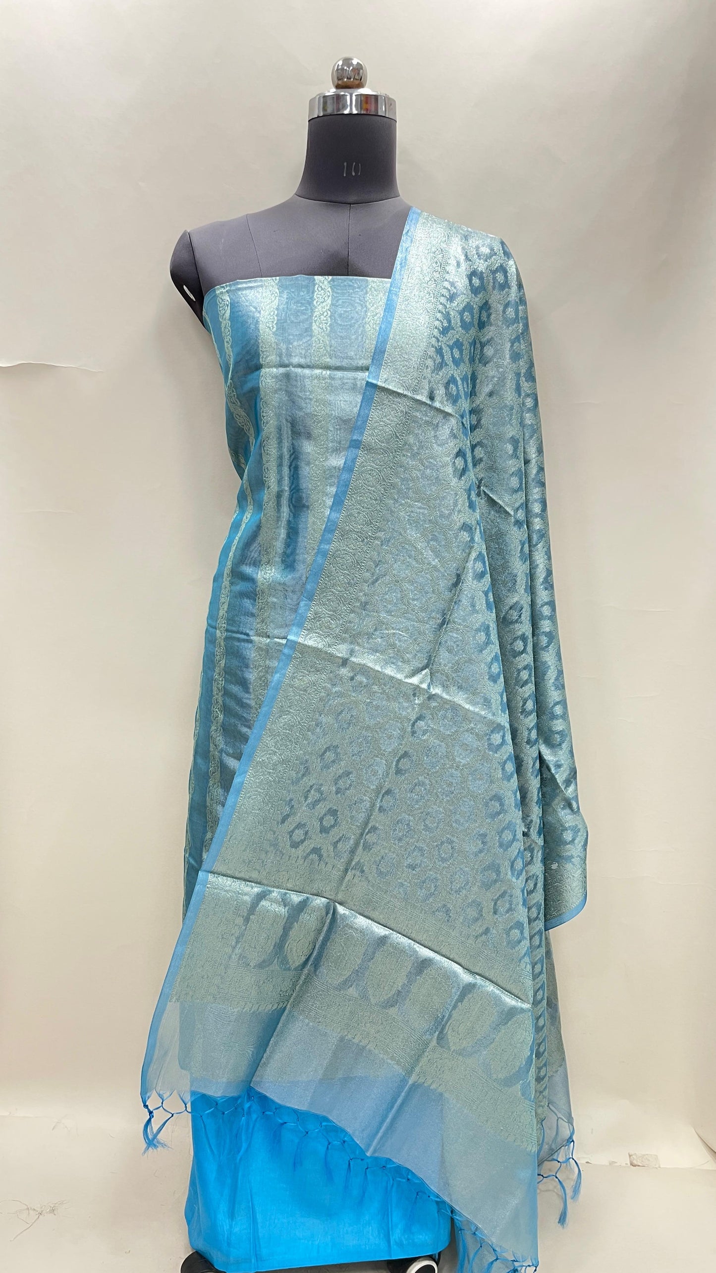 Sky blue tissue silk suit set with floral zari stripe and carry dupatta. SHL_77