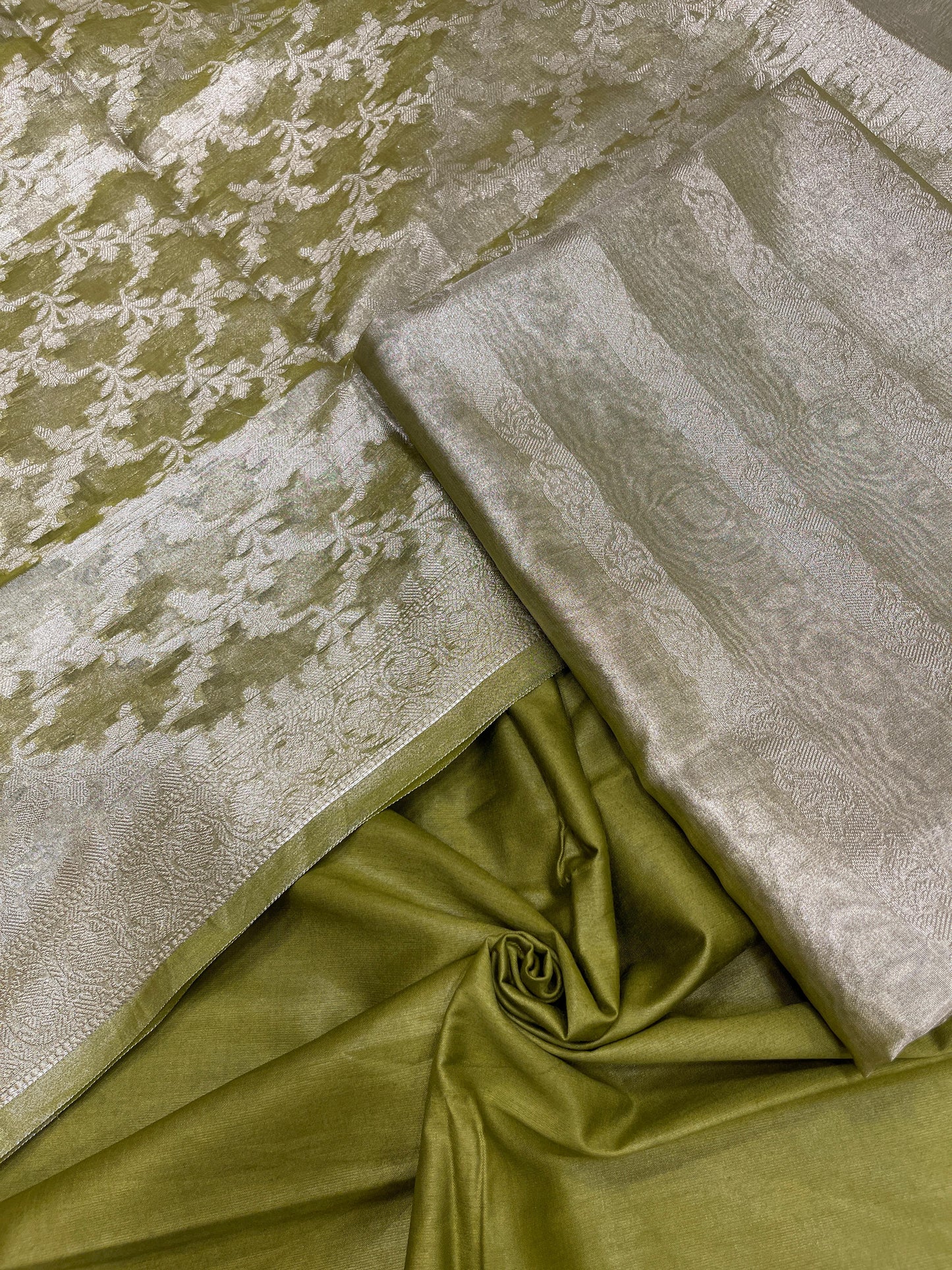Green tissue silk suit set with floral zari stripe and green dupatta. SHL_79