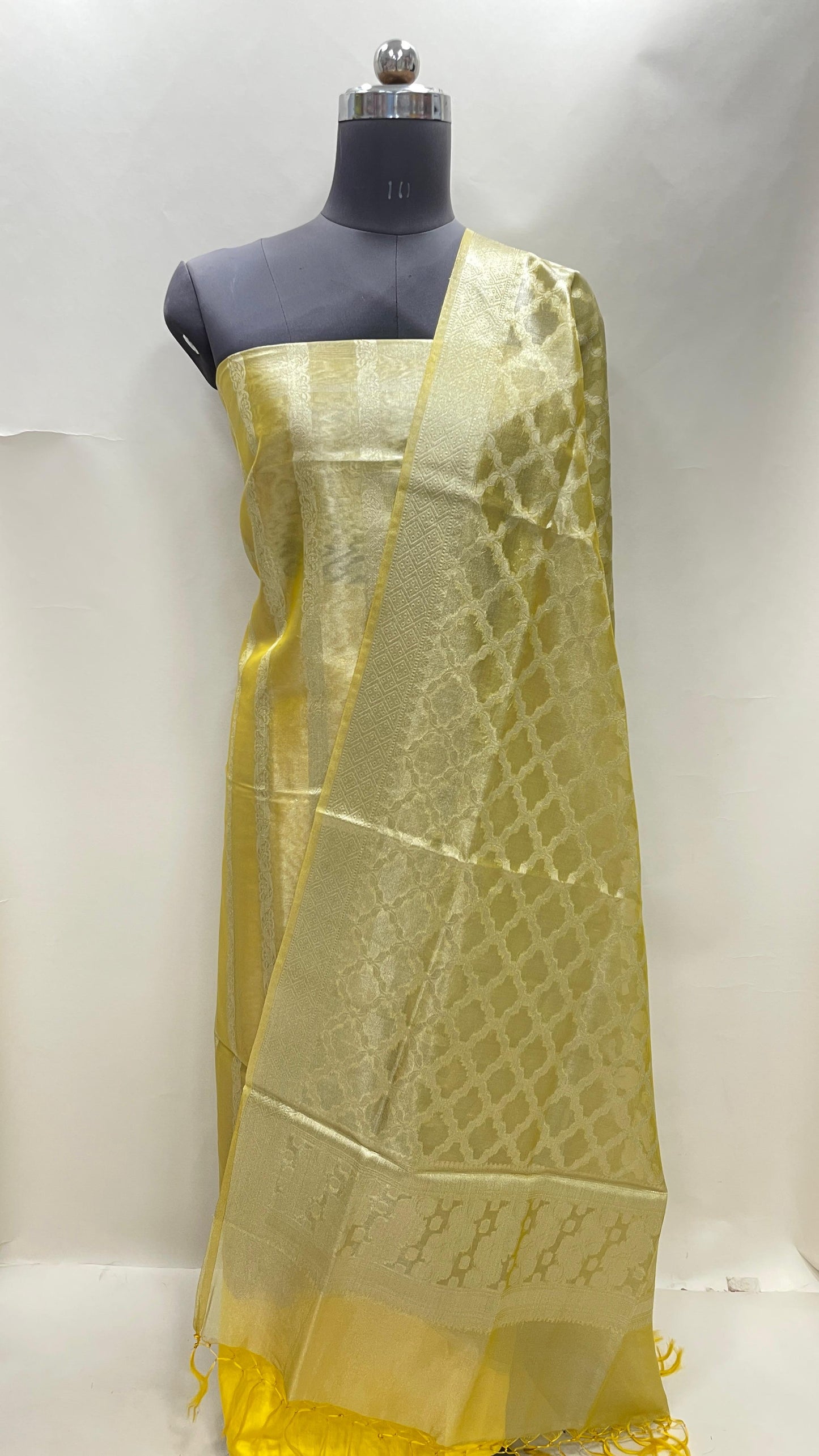 Yellow tissue silk suit with floral zari stripe, plain bottom, and jaal dupatta. SHL_81