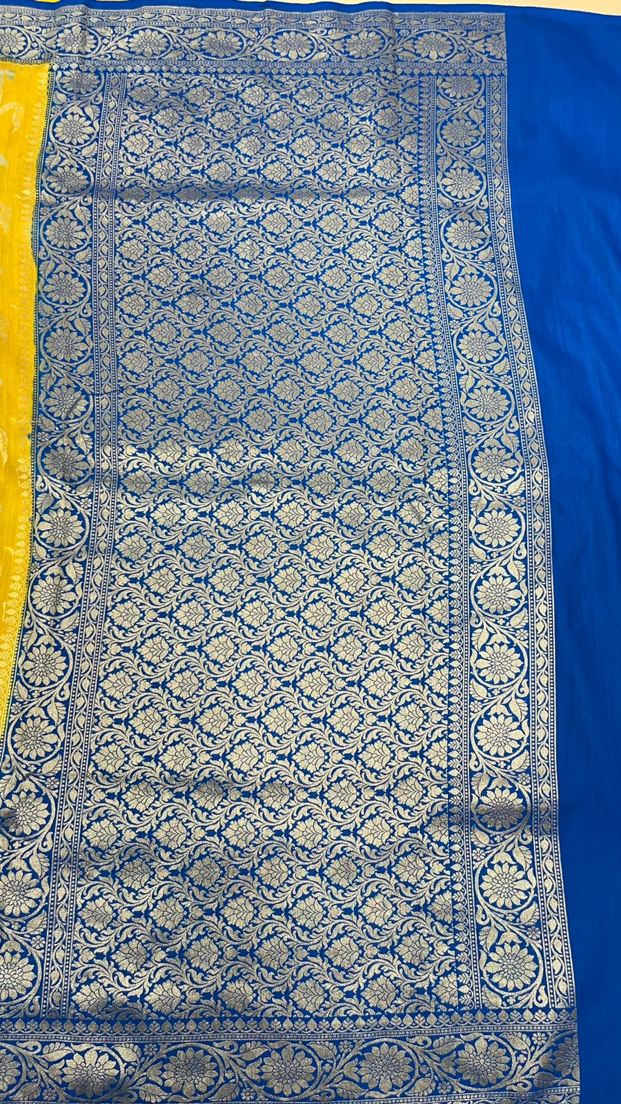 Faishana Presents Yellow Tussar Silk Handpainted Floral Zari Jaal with Contrast Blue Banarasi Floral Jaal Pallu Zari Border and Blue Blouse
