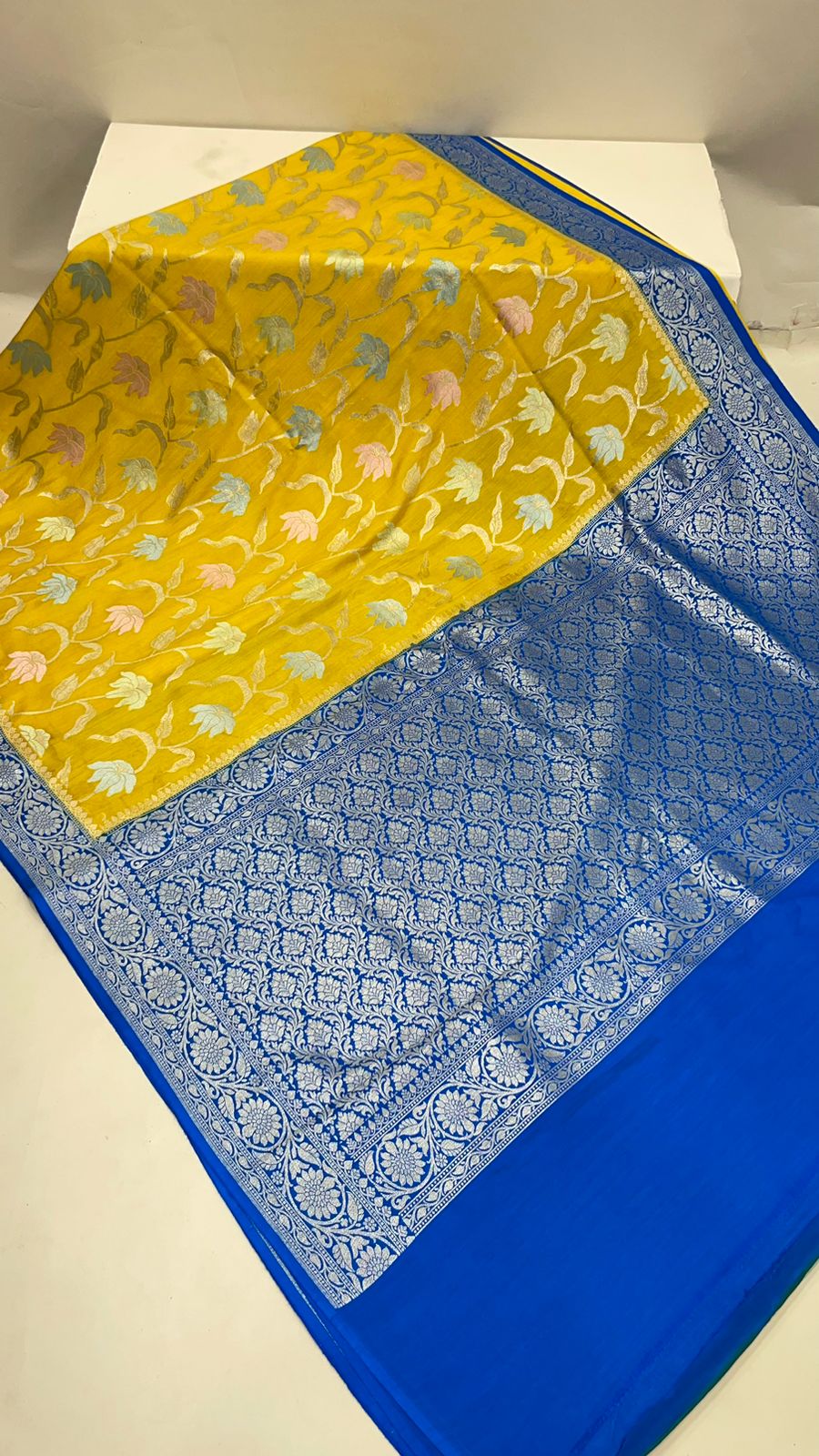 Faishana Presents Yellow Tussar Silk Handpainted Floral Zari Jaal with Contrast Blue Banarasi Floral Jaal Pallu Zari Border and Blue Blouse