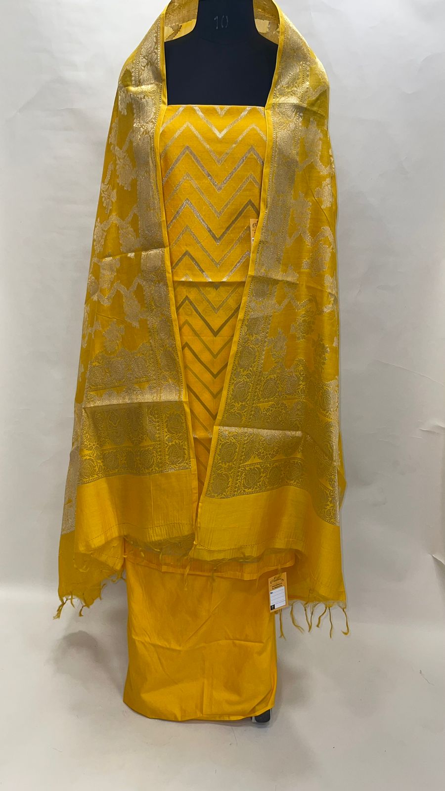 Faishana Presents Yellow Cotton Silk 3pcs Suit Set accompanied with Plain Bottom and Top Golden Zig Zag Stripe & Yellow Golden Zari Lehariya Jaal Cotton Silk Dupatta