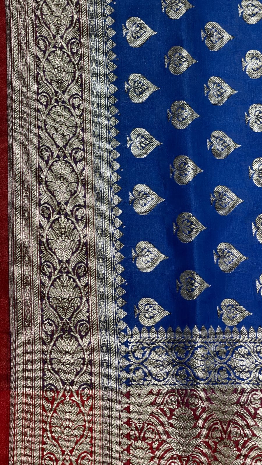 Faishana Presents Blue Satin Silk Silver Zari Pan Booti and Contrast Red Zari Border and Heavy Silver Zari Floral Anchal Banarasi Saree with Red Blouse