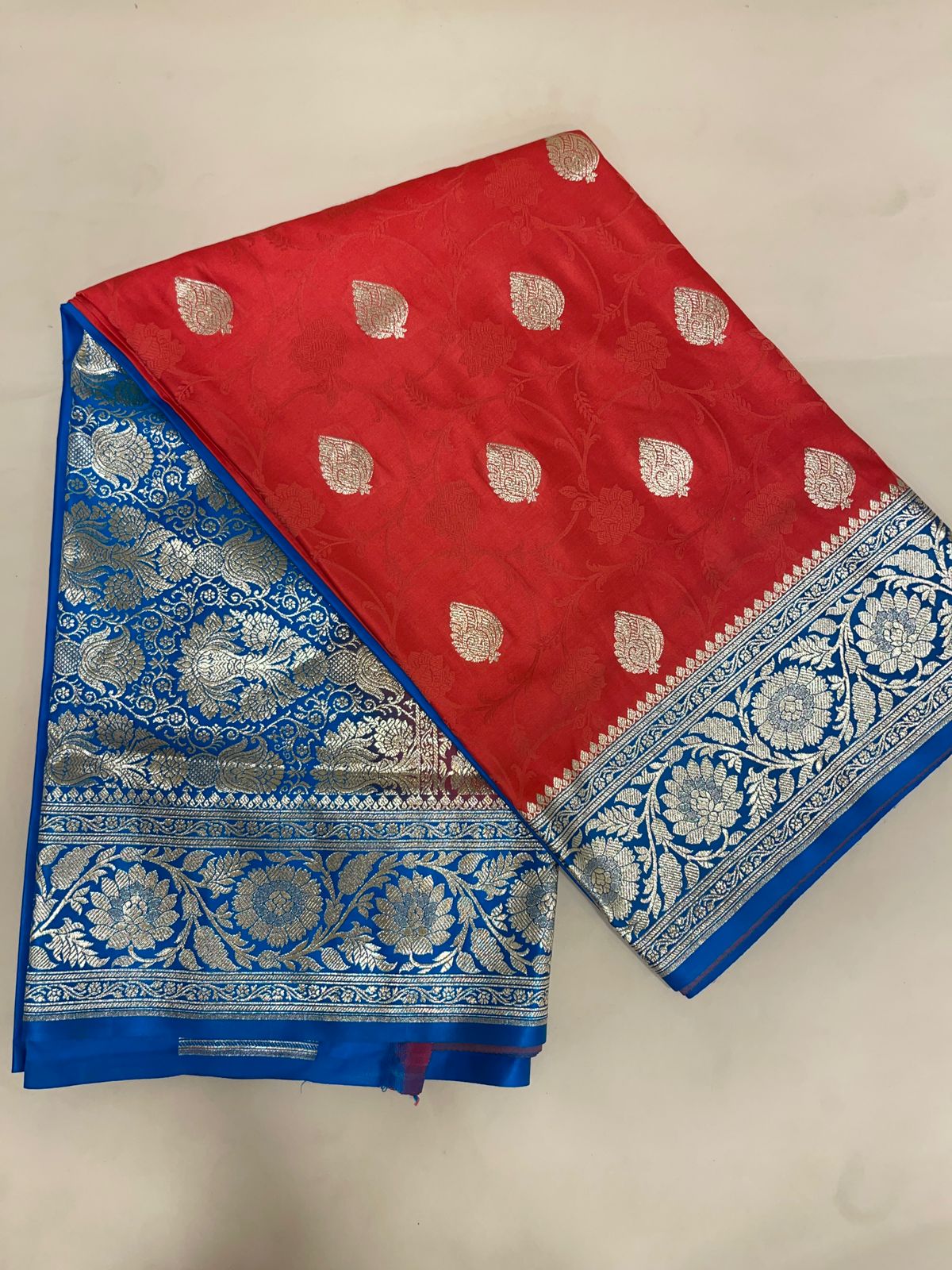 Faishana Presents Red Satin Silk Silver Zari Booti Mina Jaal Banarasi saree and Contrast Blue Silver Zari Boota Pallu with Blue Blouse