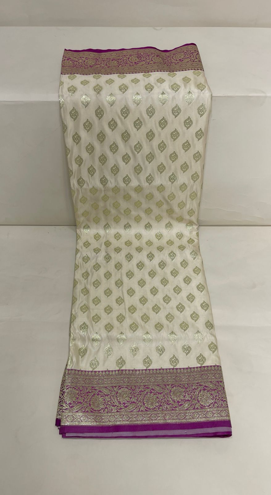 Faishana Presents Off-White Katan Silk Floral Light Gold Zari Booti with Contrast Purple Floral Pallu Banarasi saree and Purple Blouse