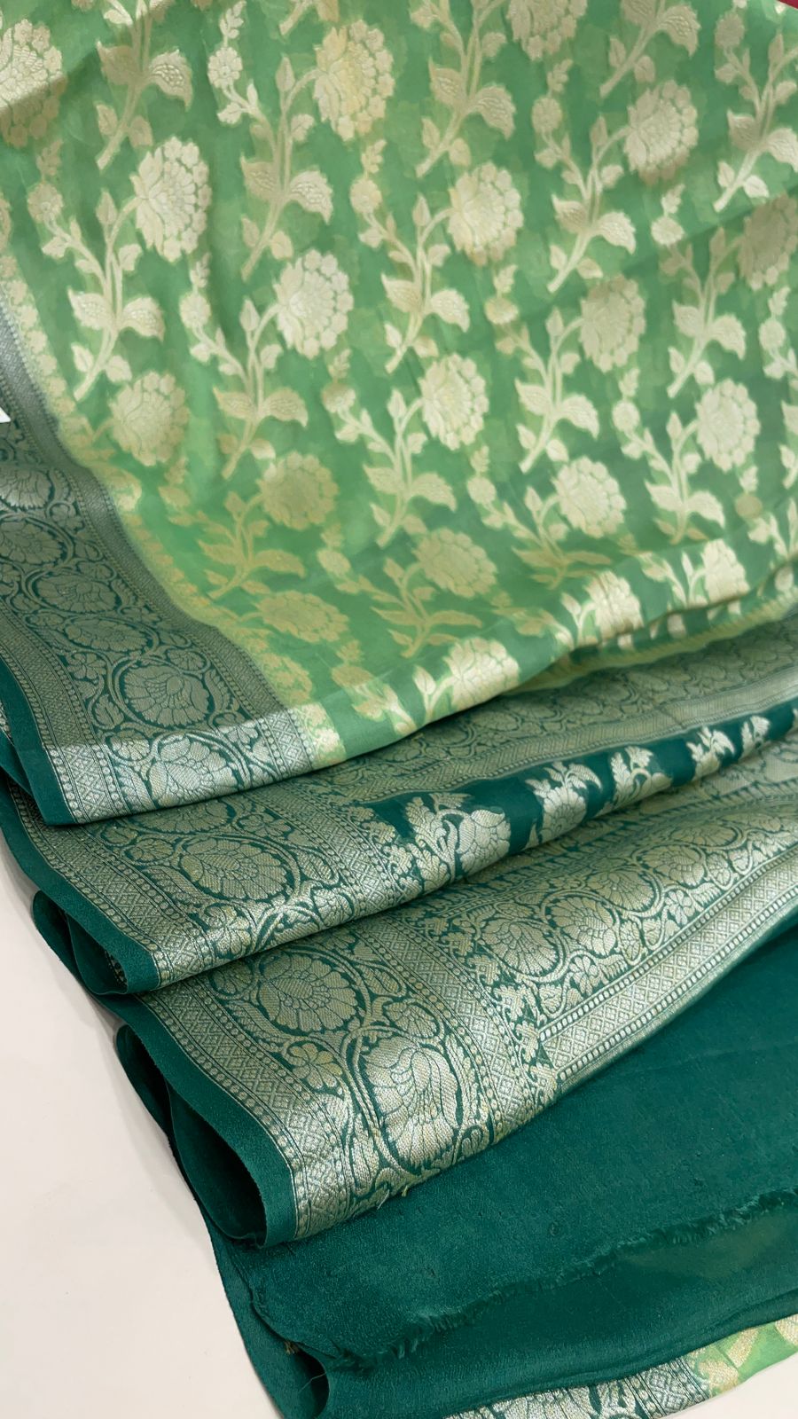 Faishana Pure Handloom Pista Green Chiffon Floral Zari Jaal Contrast Dark Green Zari Border and Big Boota Pallu with Dark Green Blouse