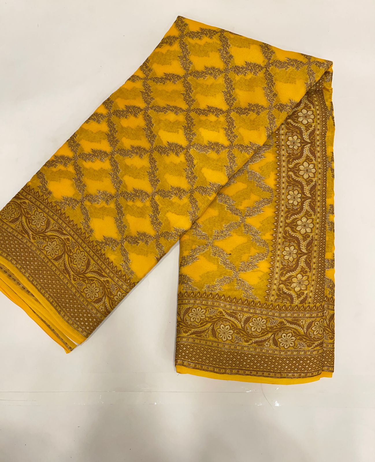 Faishana Pure Handwoven Gold Chiffon Kadiyal Copper Zari Jaal and Resham Mina Zari Boota Pallu with Gold Blouse