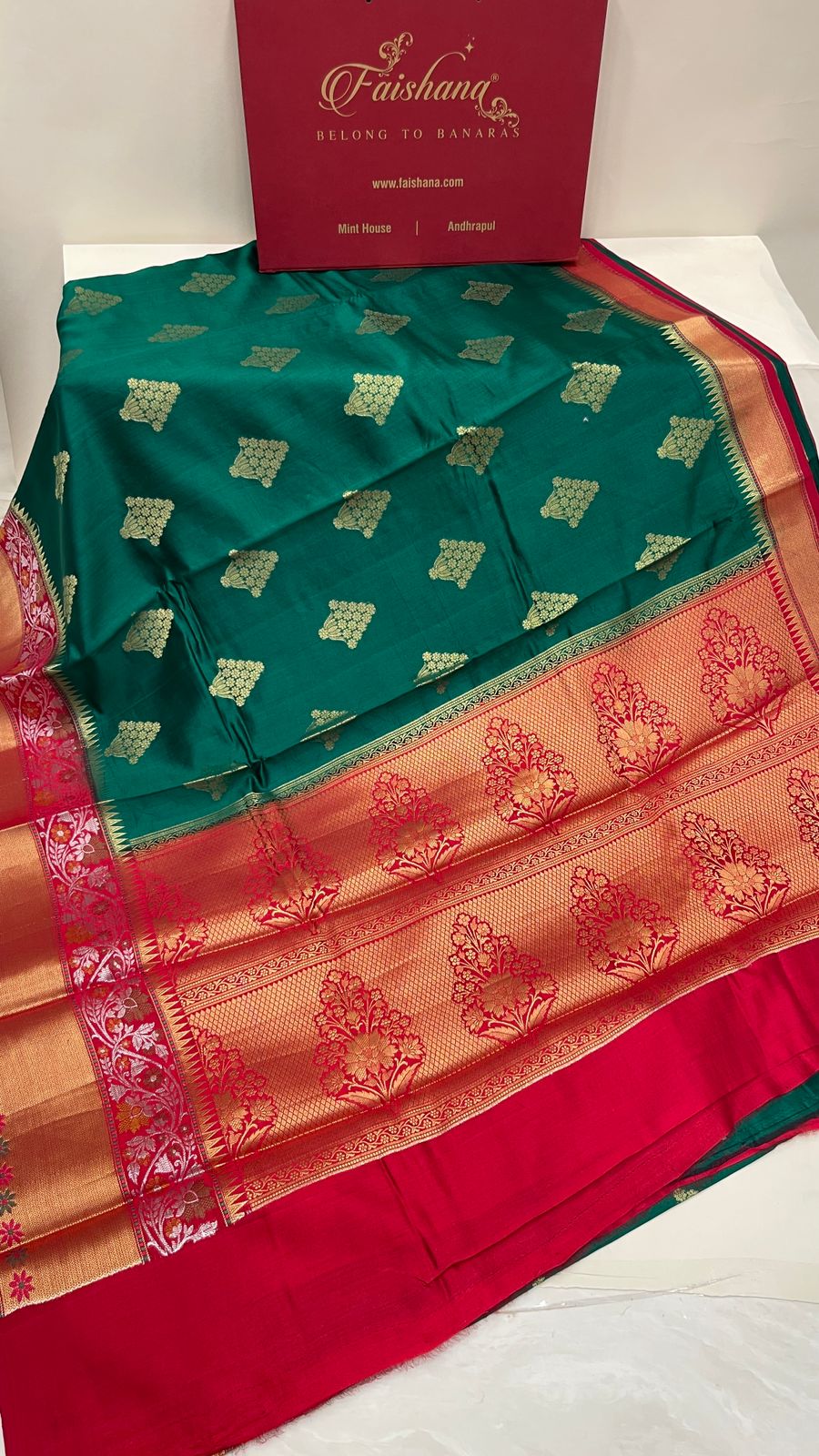 Faishana Pure Handloom Green Chiniya Silk Golden Floral Zari Booti Contrast Pink Skirt Silver Mina Zari Border Golden and Floral Boota Pallu with Pink Blouse