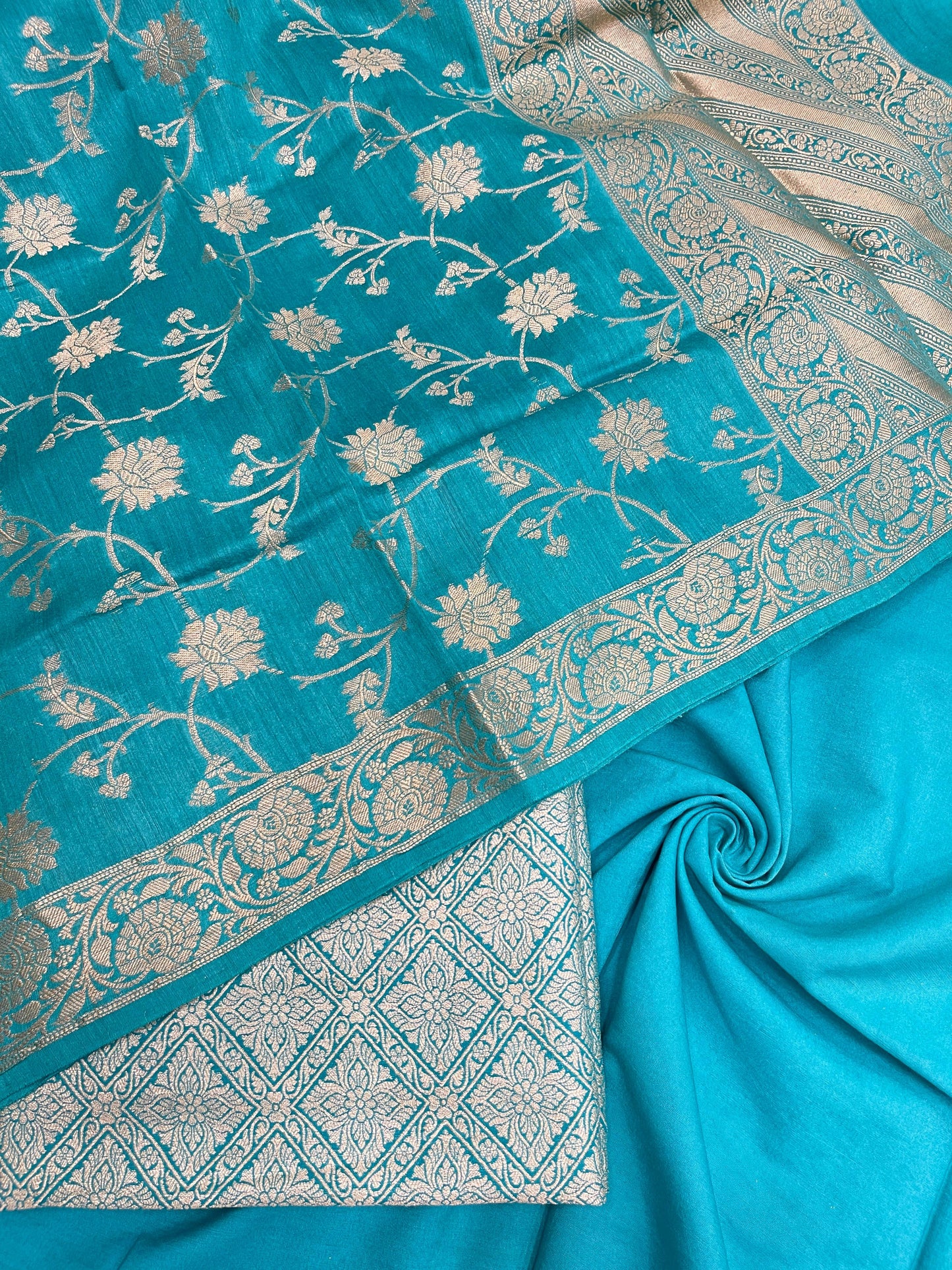 Faishana Pure Handloom Turqouise Blue Munga Silk Floral Stripe Checkered 3pcs Suit with Floral Zari Jaal Dupatta and Plain Turqouise Blue Bottom