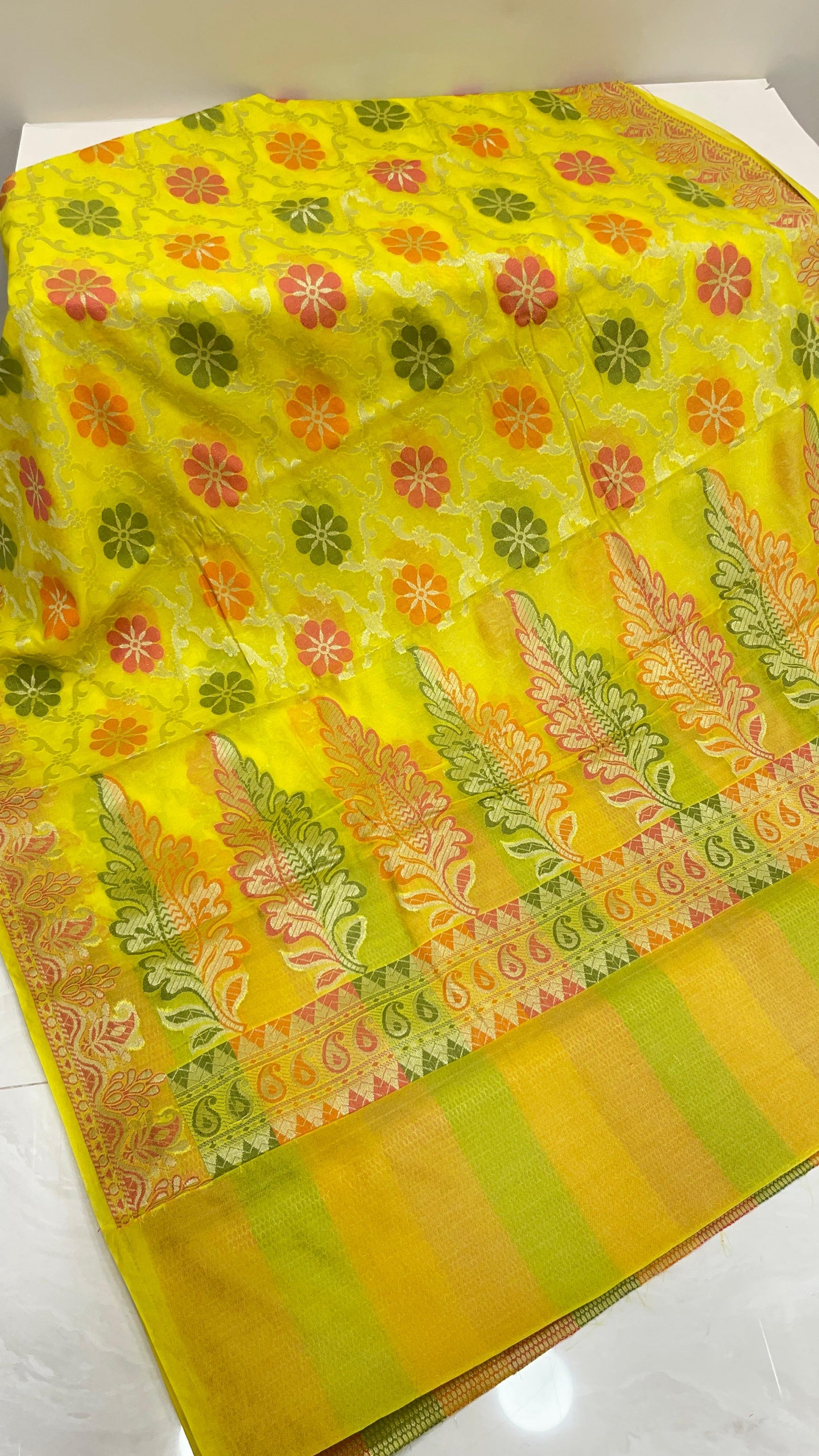 Faishana Presents Yellow Semi Georgette Alfi Mina Floral Zari Jaal Minakari Zari Border with Banarasi Floral Boota Pallu and Yellow Multi Stripe Blouse