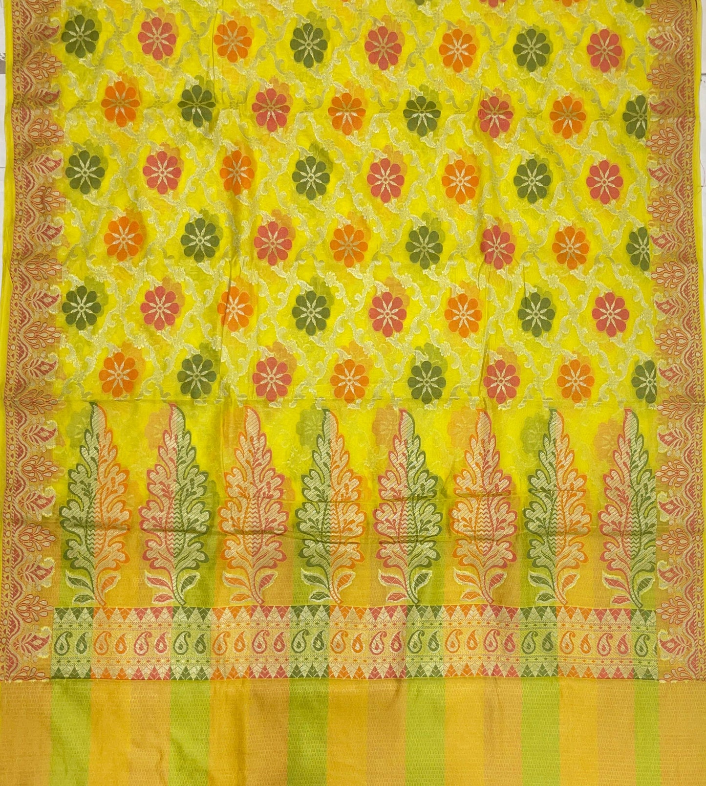 Faishana Presents Yellow Semi Georgette Alfi Mina Floral Zari Jaal Minakari Zari Border with Banarasi Floral Boota Pallu and Yellow Multi Stripe Blouse