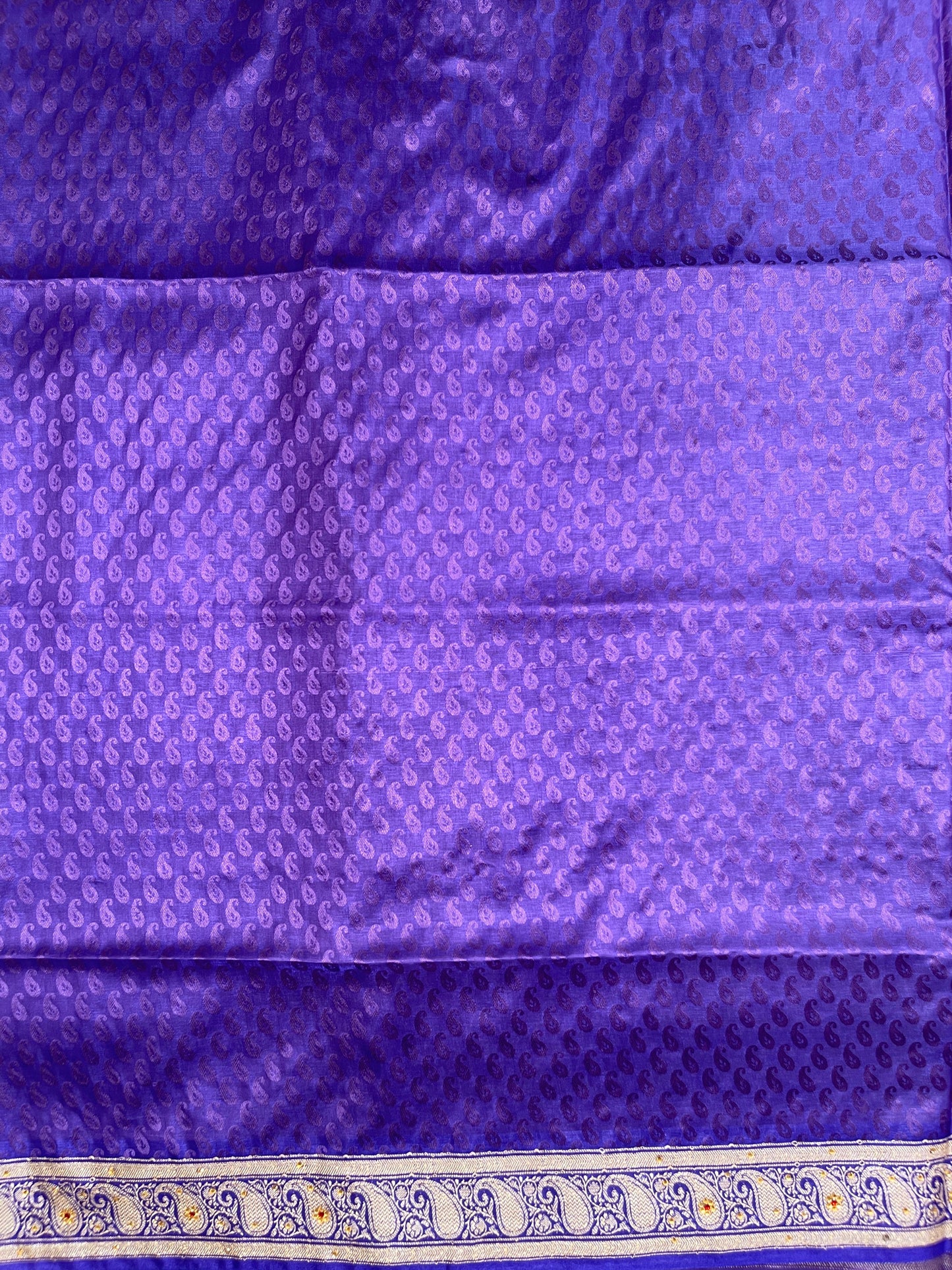 Faishana Presents Orange Tanchoi Silk Low Stone Work with Contrast Blue Pallu Zari Border and Purple Blouse