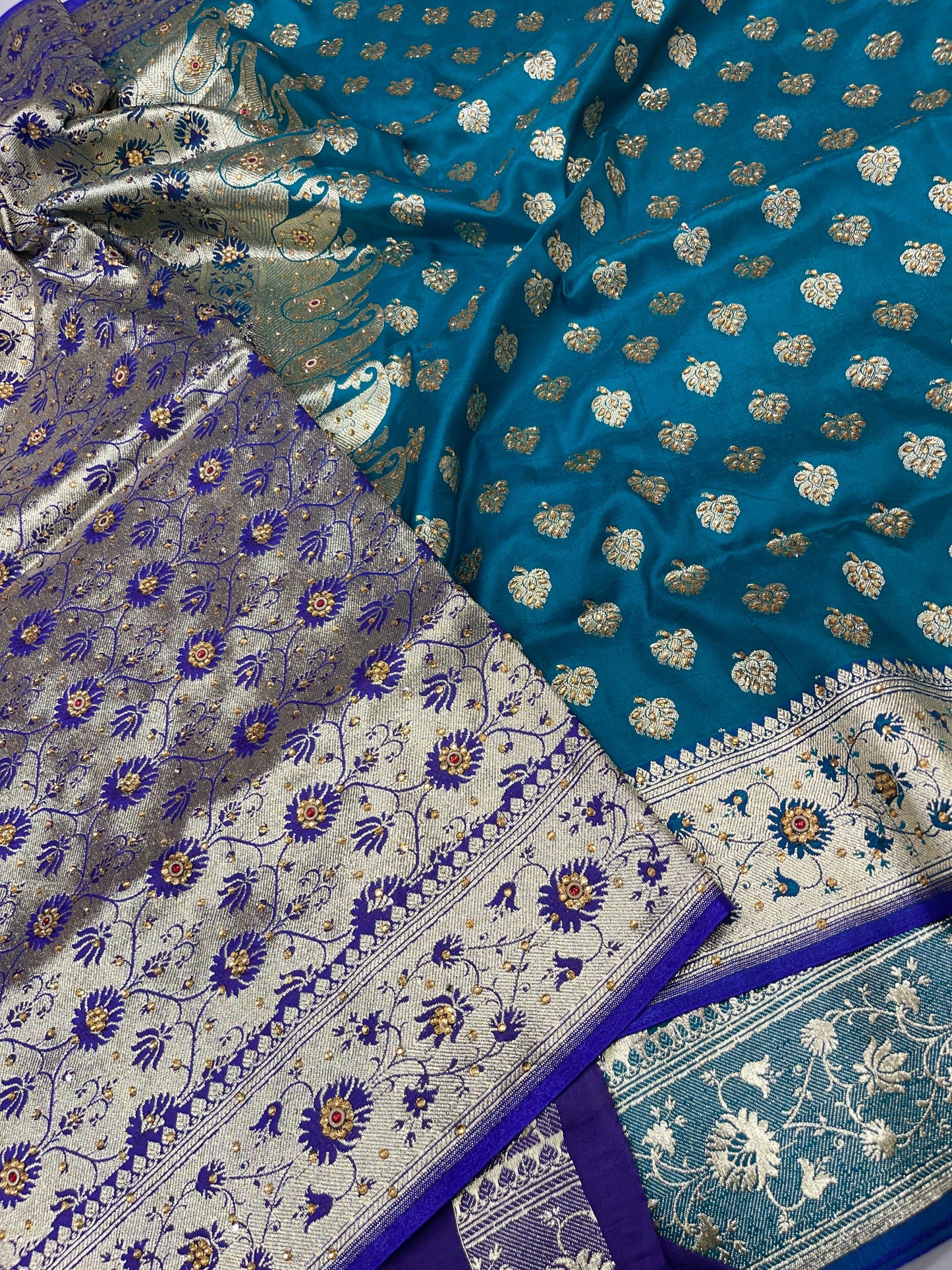 Faishana Presents Seagreen Satin Silk Floral Zari Booti Low Stone Work Banarasi Saree with Contrast Purple Pallu and Purple Blouse