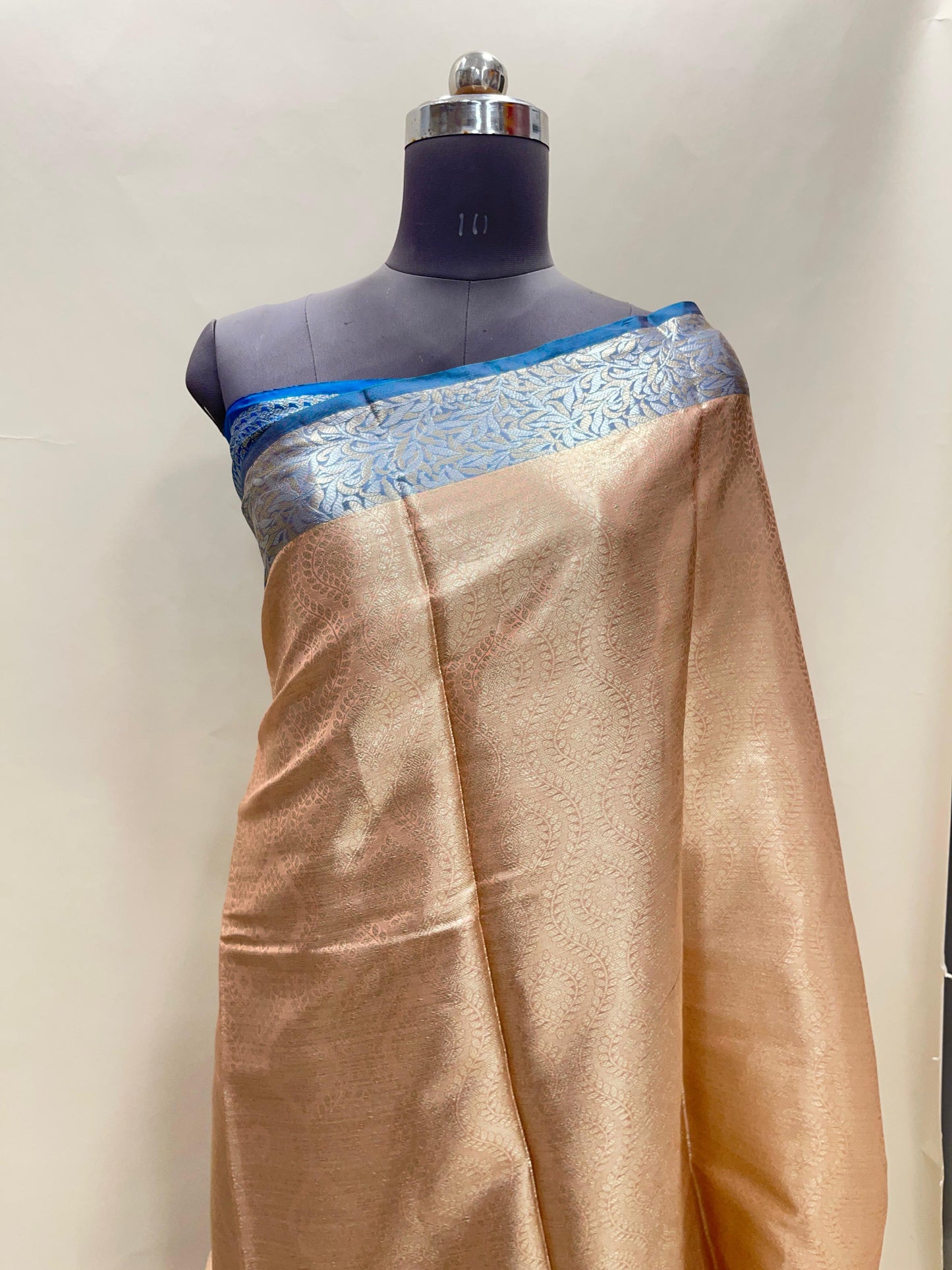 Faishana Presents Peach Art Silk Floral Lehariya Sliver Jaal with Contrast Blue Pallu and Olive Copper Silver Jaal Zari Border with Blue Blouse