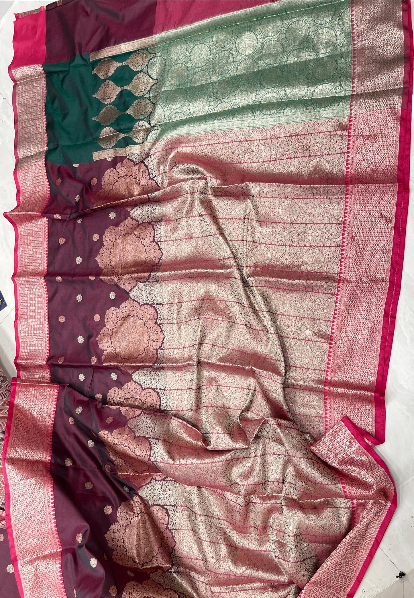Faishana Presents Burgundy Floral Copper Zari Boota with Contrast Green Pallu Banarasi Zari Border with Green Multi Stripe Blouse