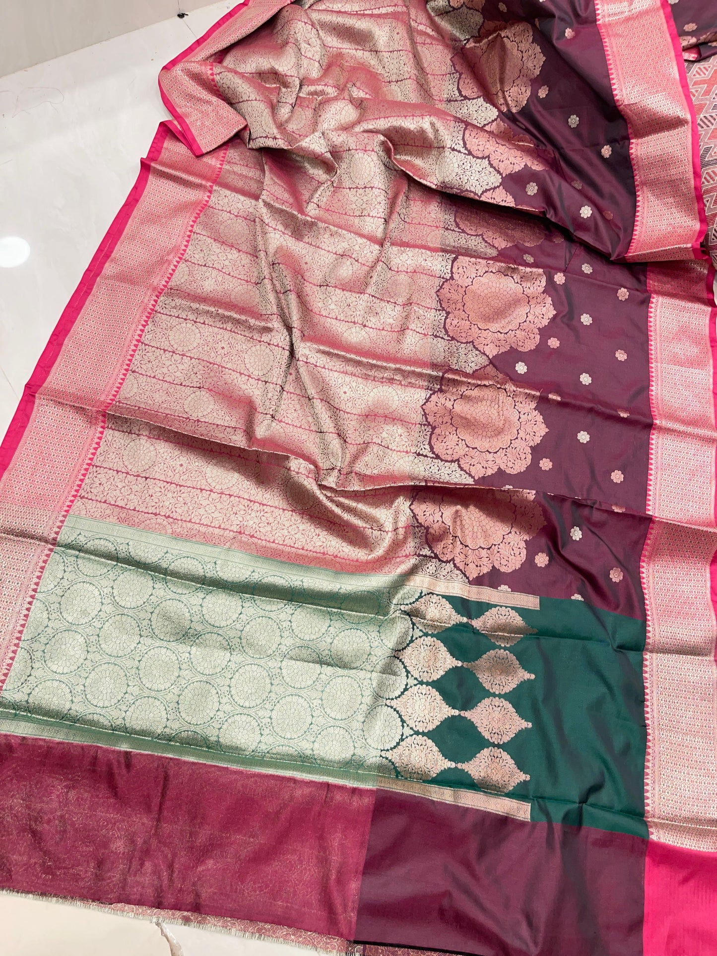 Faishana Presents Burgundy Floral Copper Zari Boota with Contrast Green Pallu Banarasi Zari Border with Green Multi Stripe Blouse