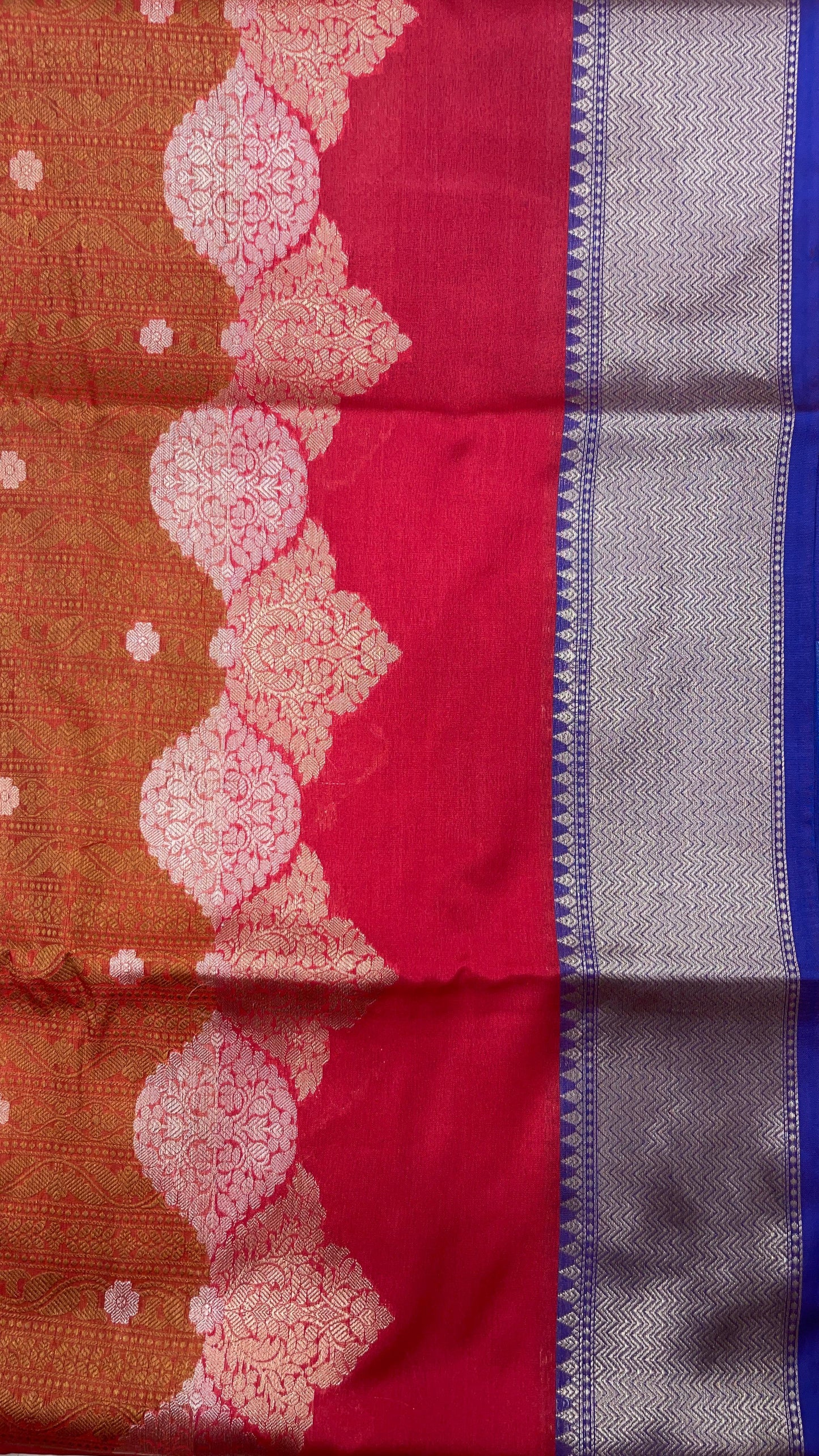 Faishana Presents Orange Floral Mina Zari Stripe and Dual Skirt Copper and Silver Boota with Contrast Beige Pallu Blue Zari Border and Blue Blouse