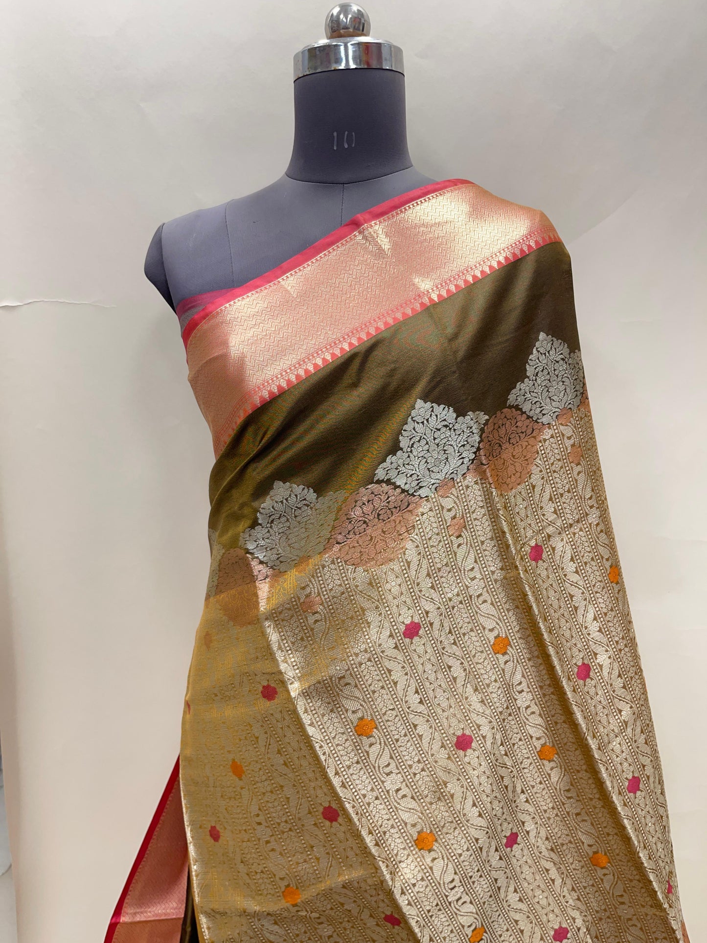 Faishana Presents Olive Green Floral Mina Zari Stripe and Dual Skirt Copper and Silver Boota with Contrast Green Pallu Banarasi Zari Border and Green Blouse