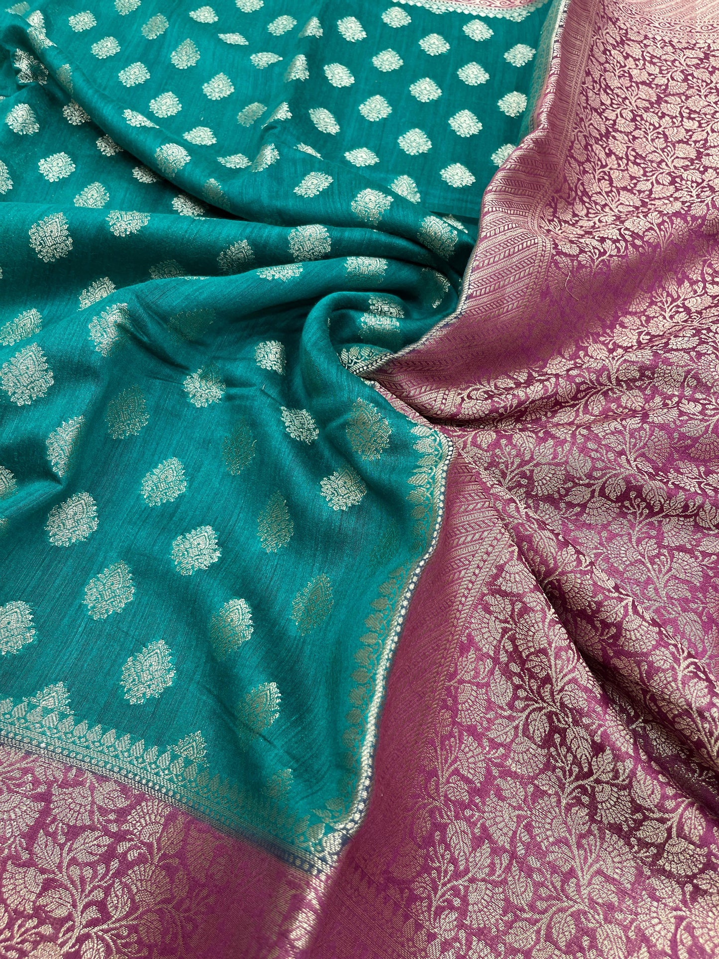 Faishana Pure Handloom Bottle Green Munga Silk Floral Gold Zari Booti with Contrast Purple Floral Jaal Pallu Skirt Dual Shade Zari Border with Purple Blouse