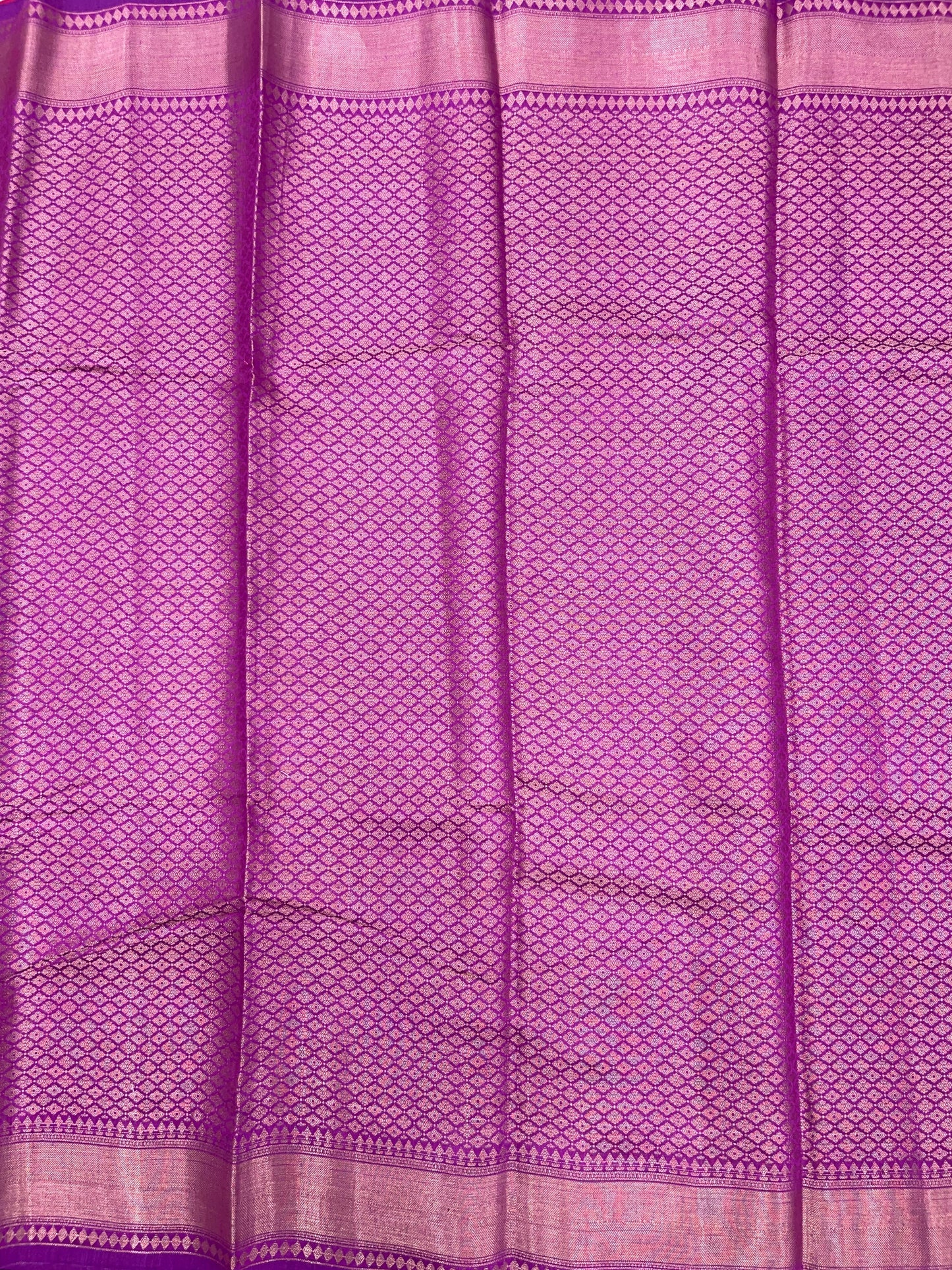 Faishana Pure Handloom Magenta Munga Silk Floral Copper Zari Jaal with Contrast Purple Polka Dot Pallu Skirt Dual Shade Mina Zari Border with Purple Blouse