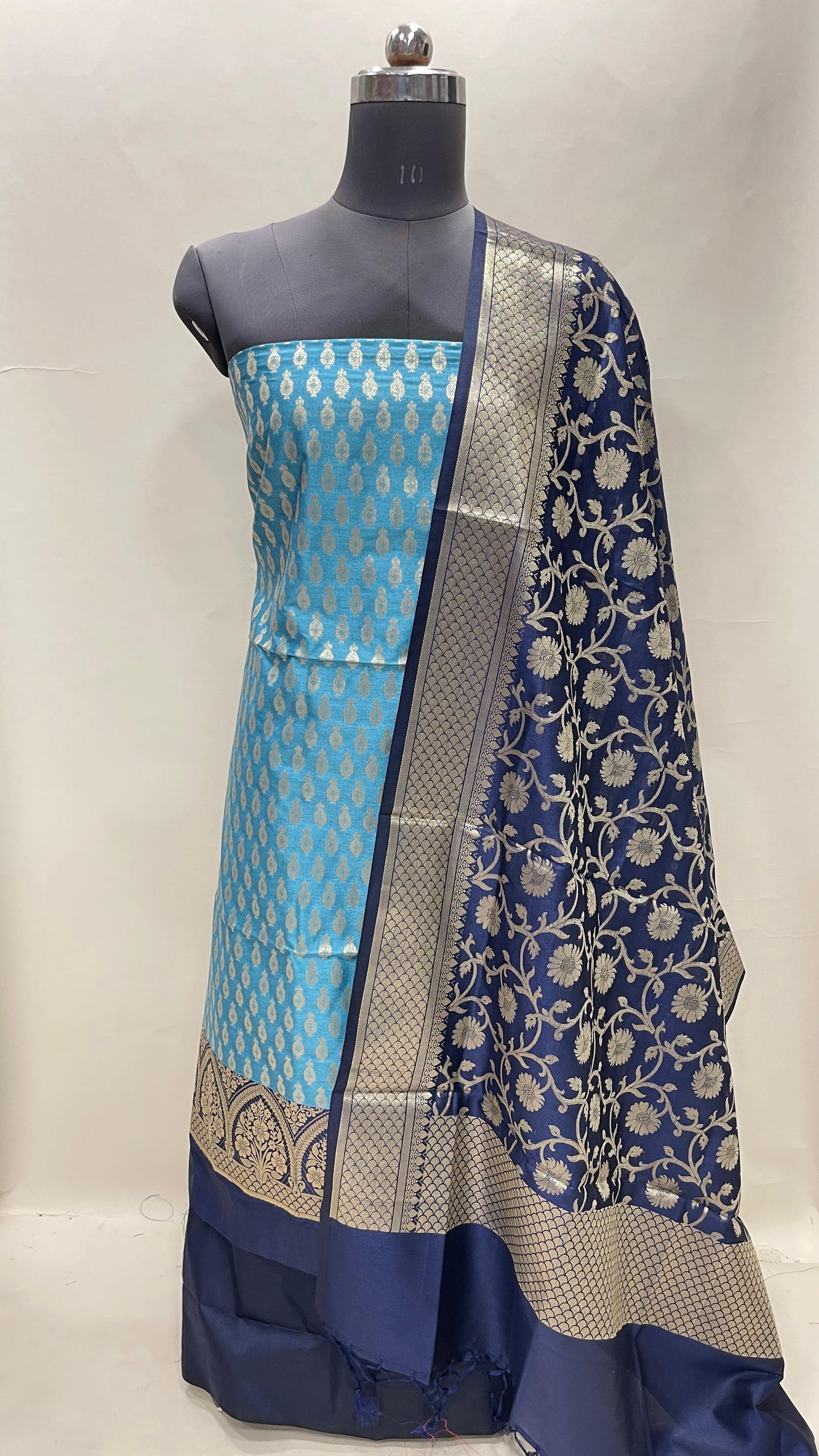 Faishana Presents Blue Semi Katan Silk 3 pcs Suit Set with Contrast Navy Blue Plain Bottom and Top Floral Zari Booti with Alfi Jaal Navy Blue Dupatta ASD_115