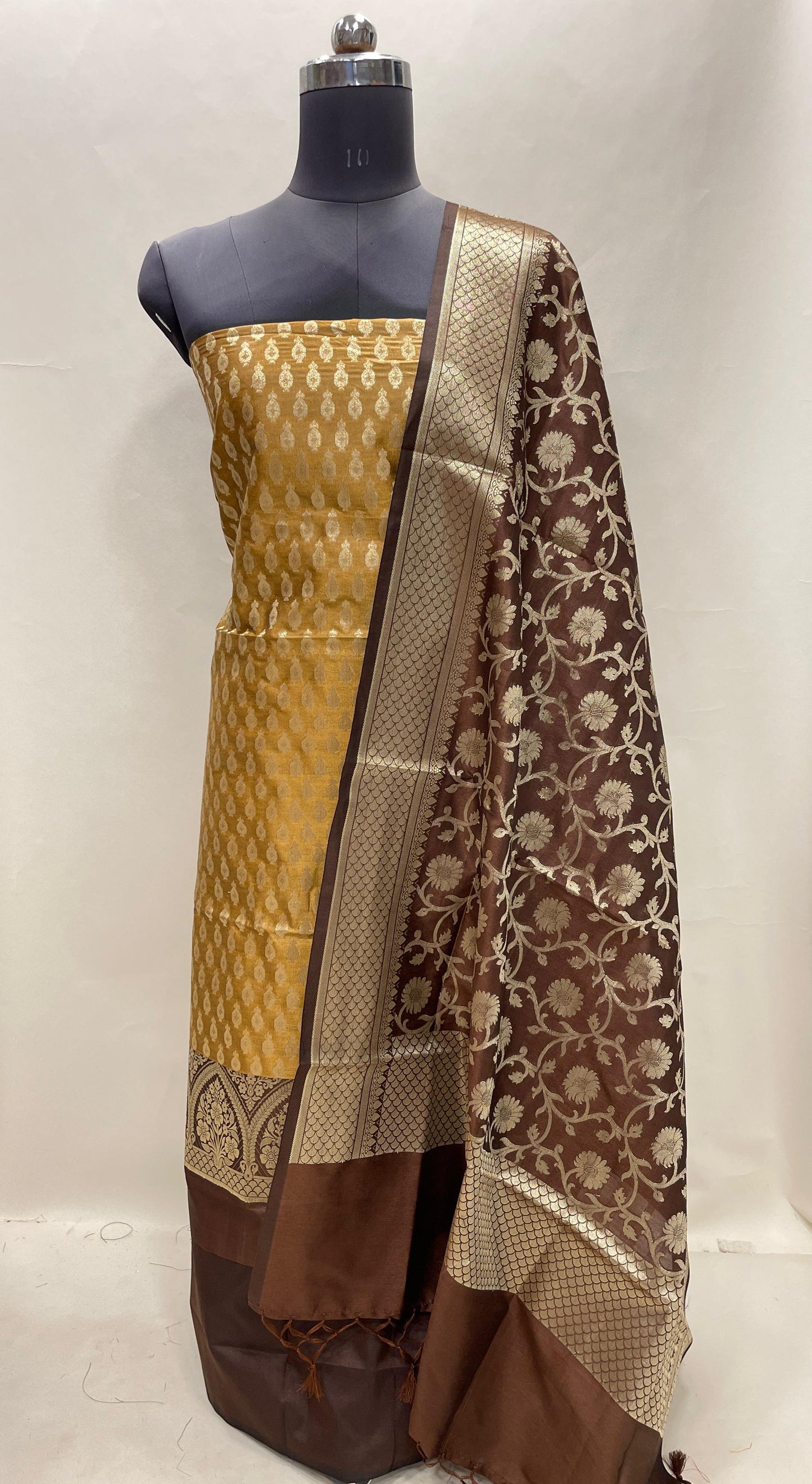 Faishana Presents Mustard Gold Semi Katan Silk 3 pcs Suit Set with Contrast Brown Plain Bottom and Top Floral Zari Booti with Alfi Jaal Brown Dupatta ASD_116