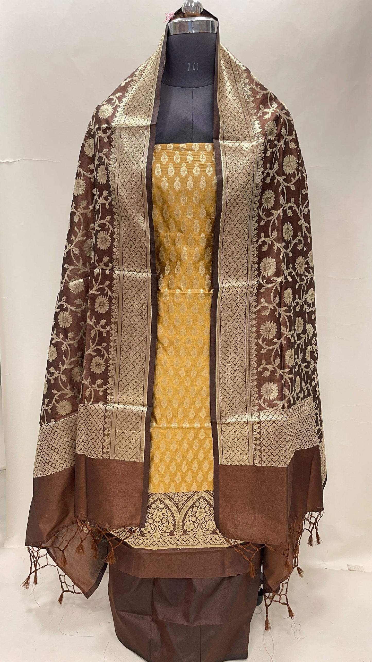 Faishana Presents Mustard Gold Semi Katan Silk 3 pcs Suit Set with Contrast Brown Plain Bottom and Top Floral Zari Booti with Alfi Jaal Brown Dupatta ASD_116