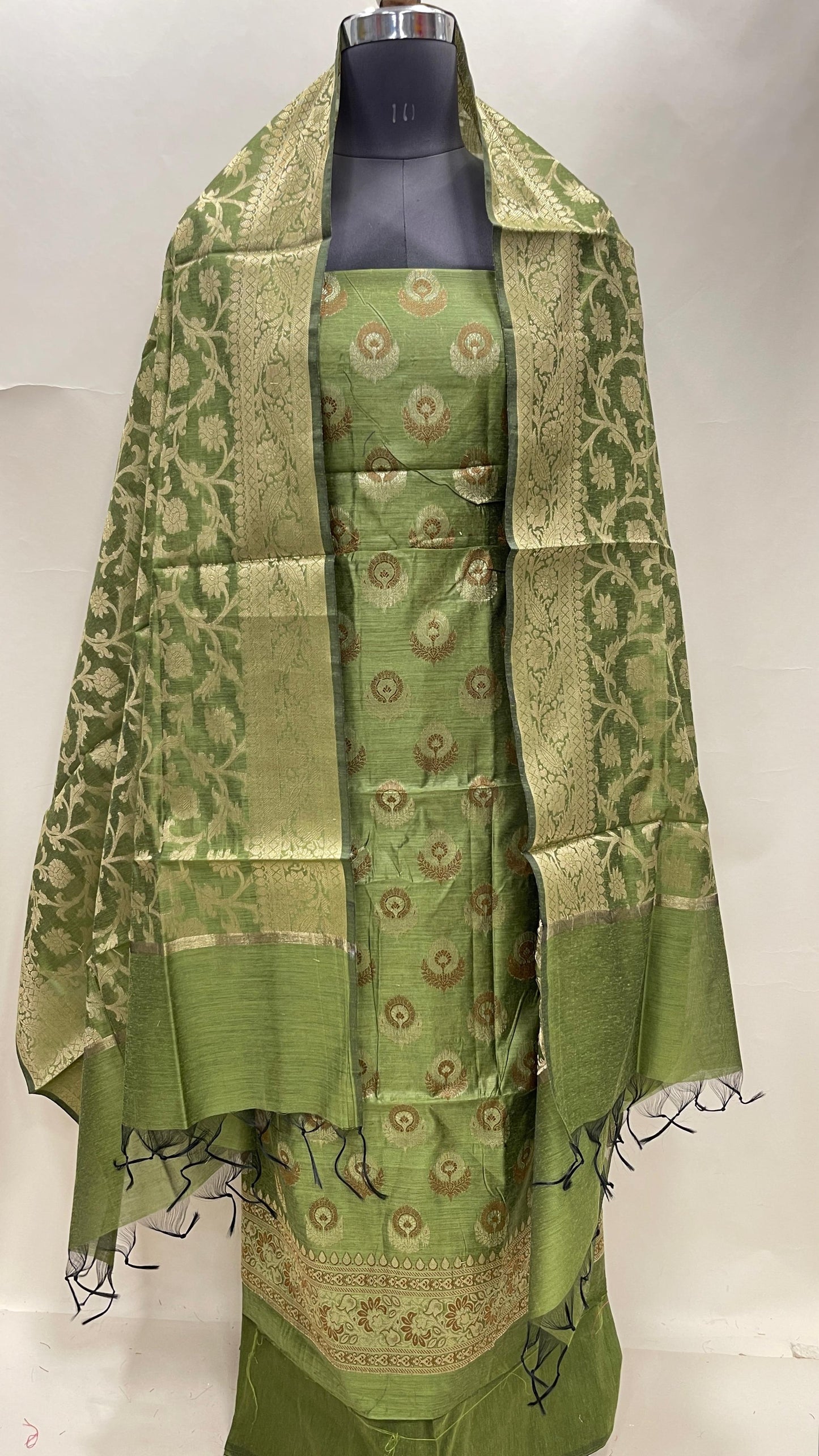 Green cotton suit featuring floral zari resham mina bootis and jaal dupatta. SHL_13