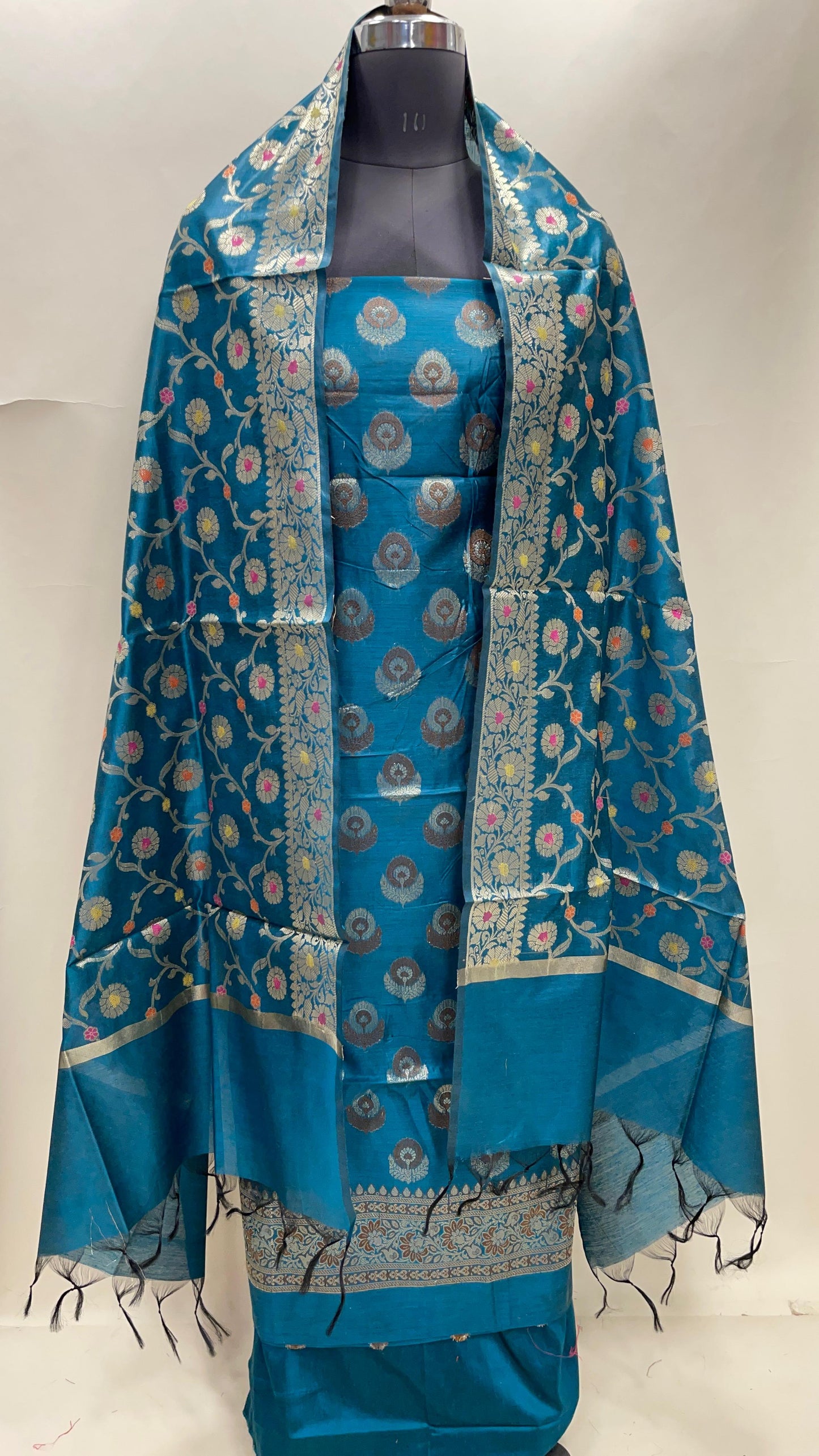 Dark seagreen cotton suit with floral zari resham mina bootis and jaal dupatta. SHL_12