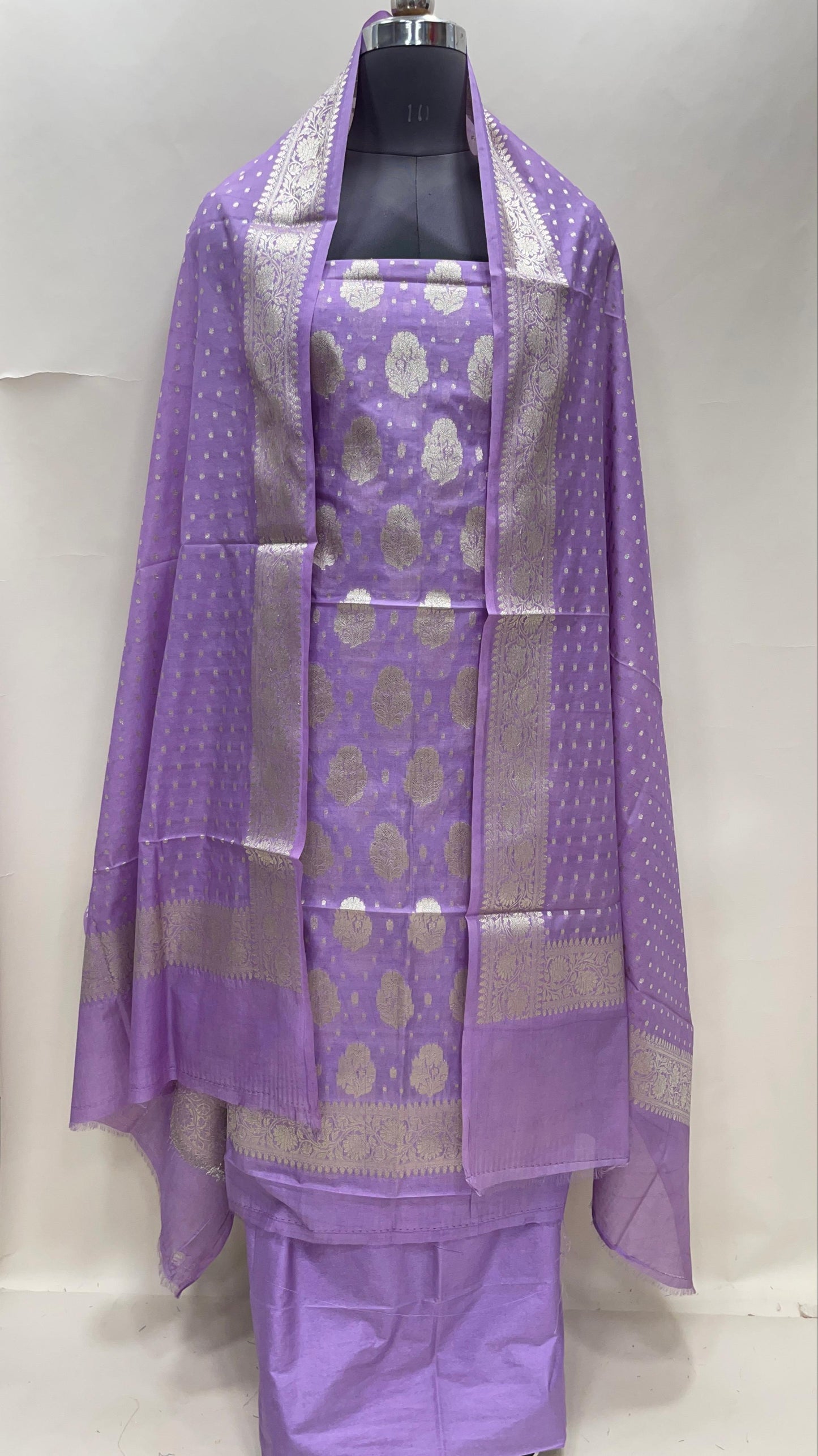 Light purple semi-georgette suit set with floral silver zari bootis and matching dupatta. SHL_42