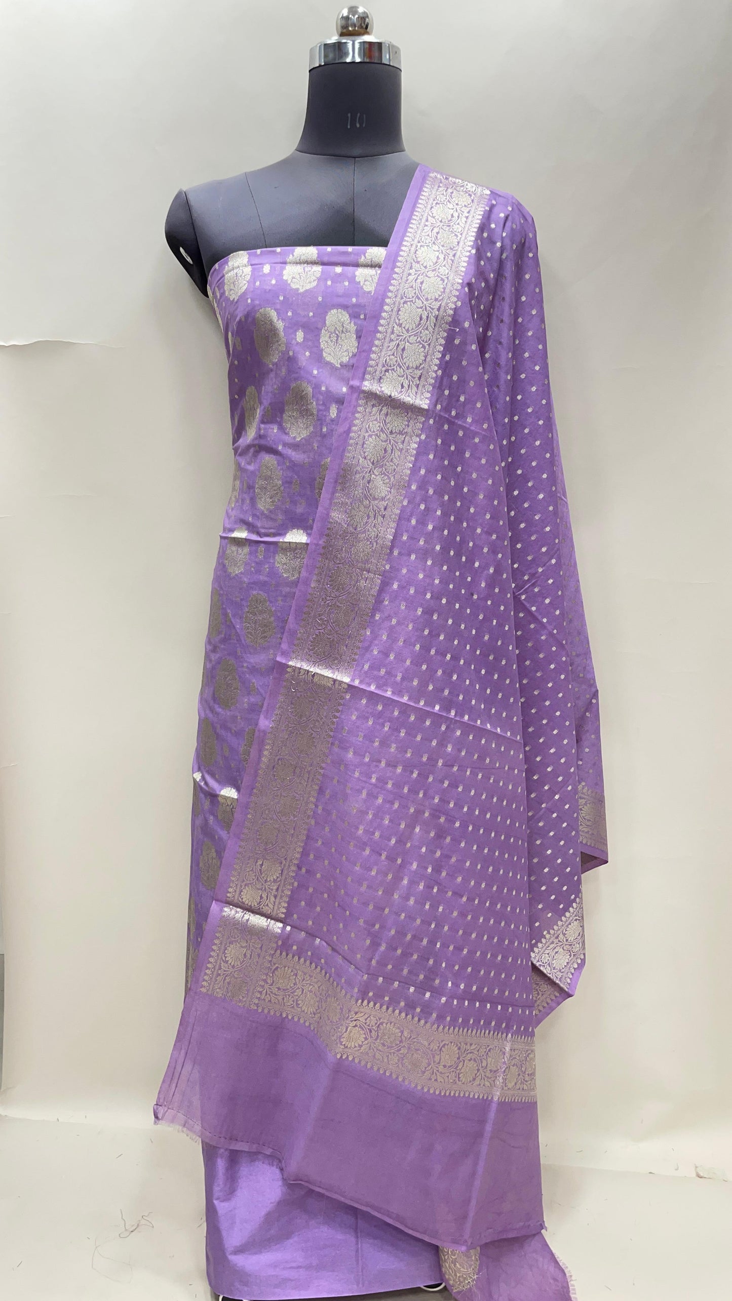 Light purple semi-georgette suit set with floral silver zari bootis and matching dupatta. SHL_42