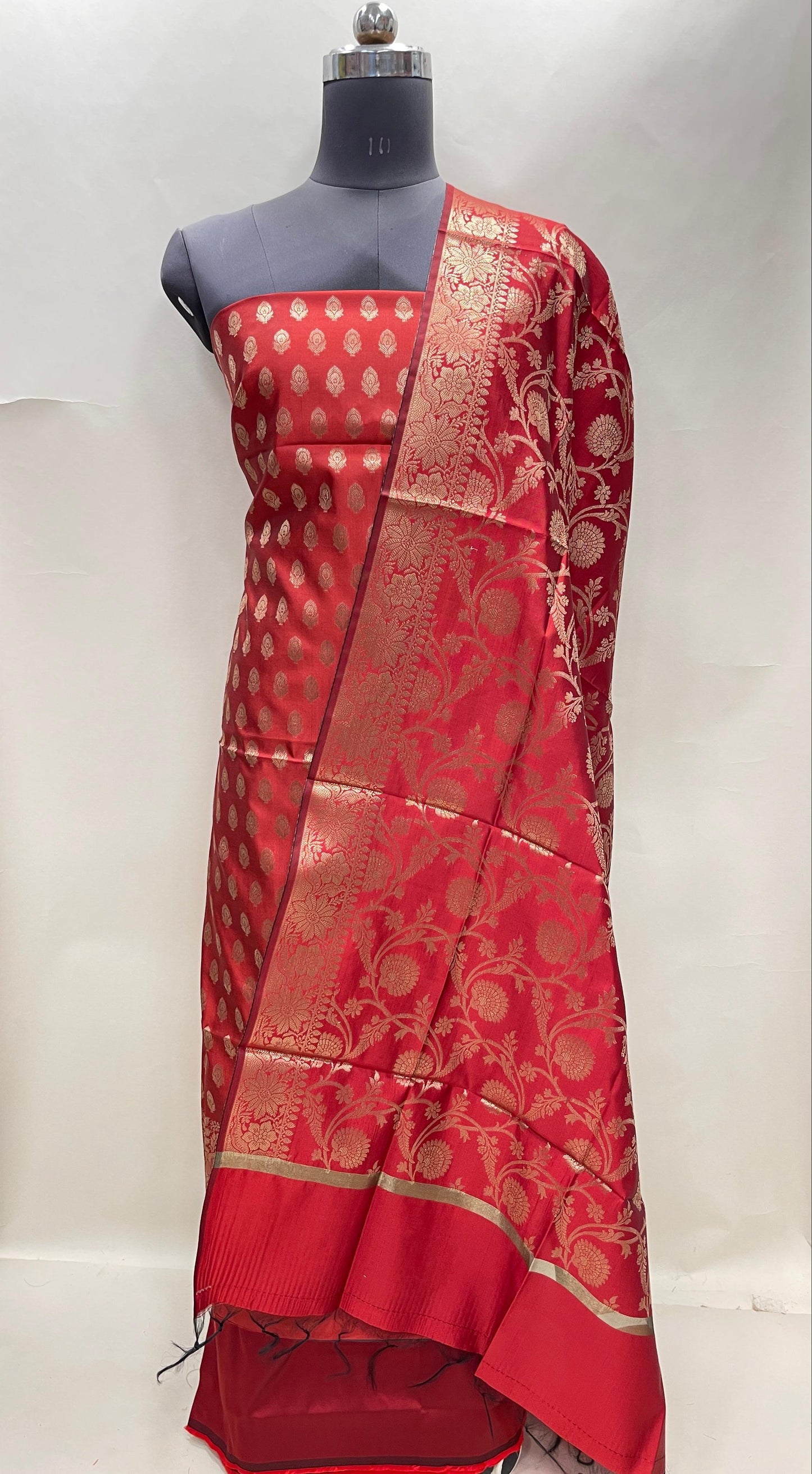 Red art silk suit set featuring floral zari bootis and matching dupatta. SHL_59